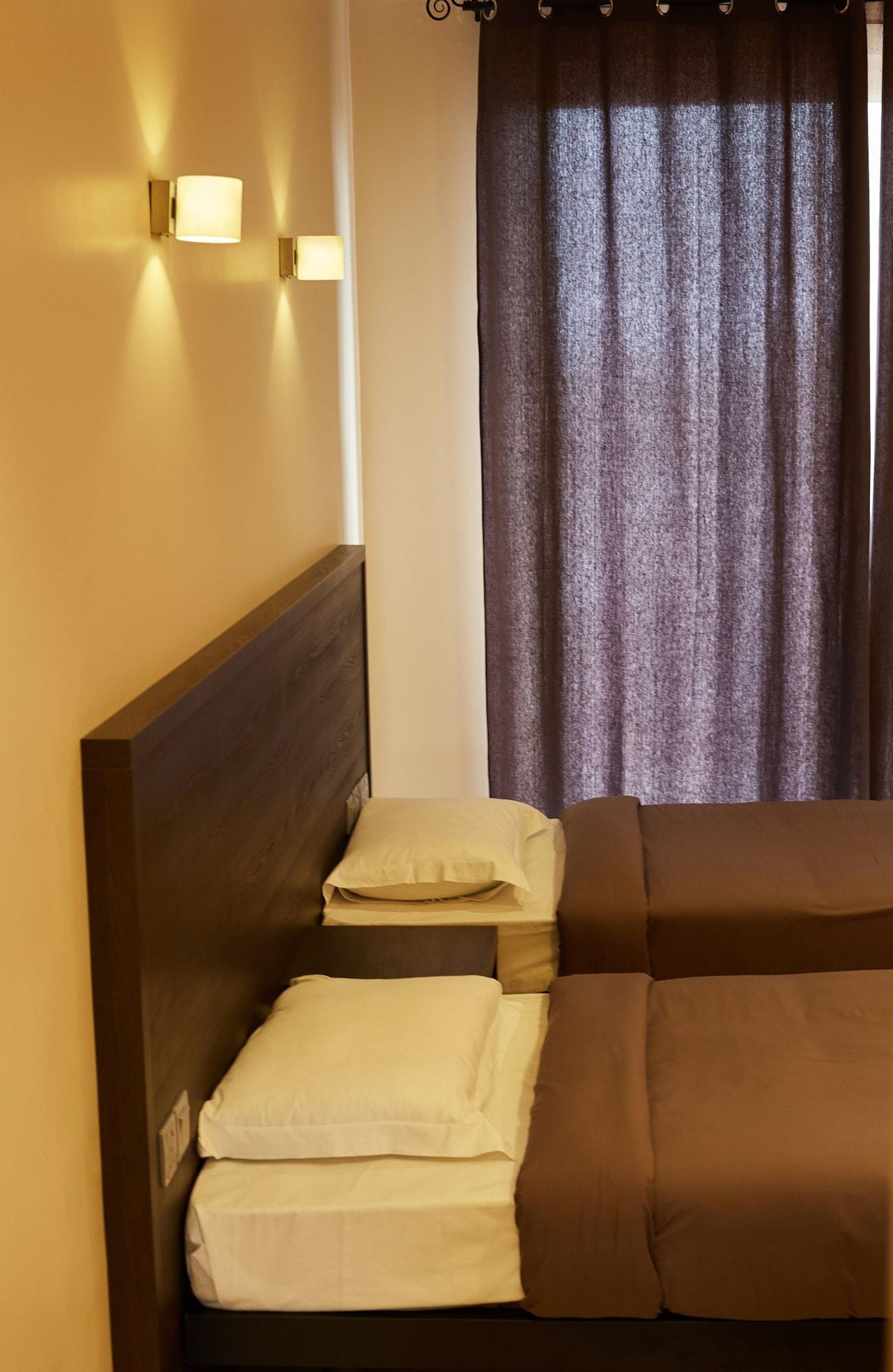 Habitación Axis Suites Hotel