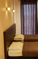 Alojamiento - Axis Suites Hotel