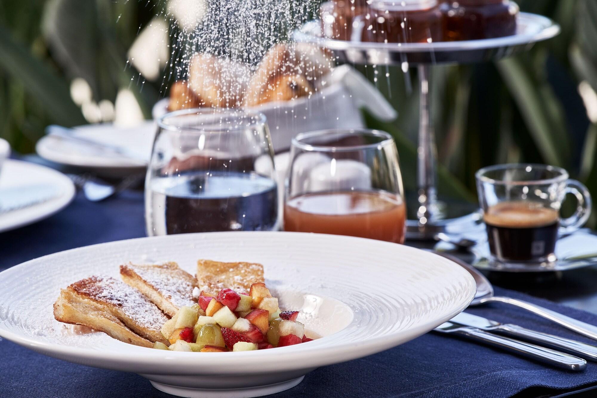 Restaurant Bellevue On The Beach Suites