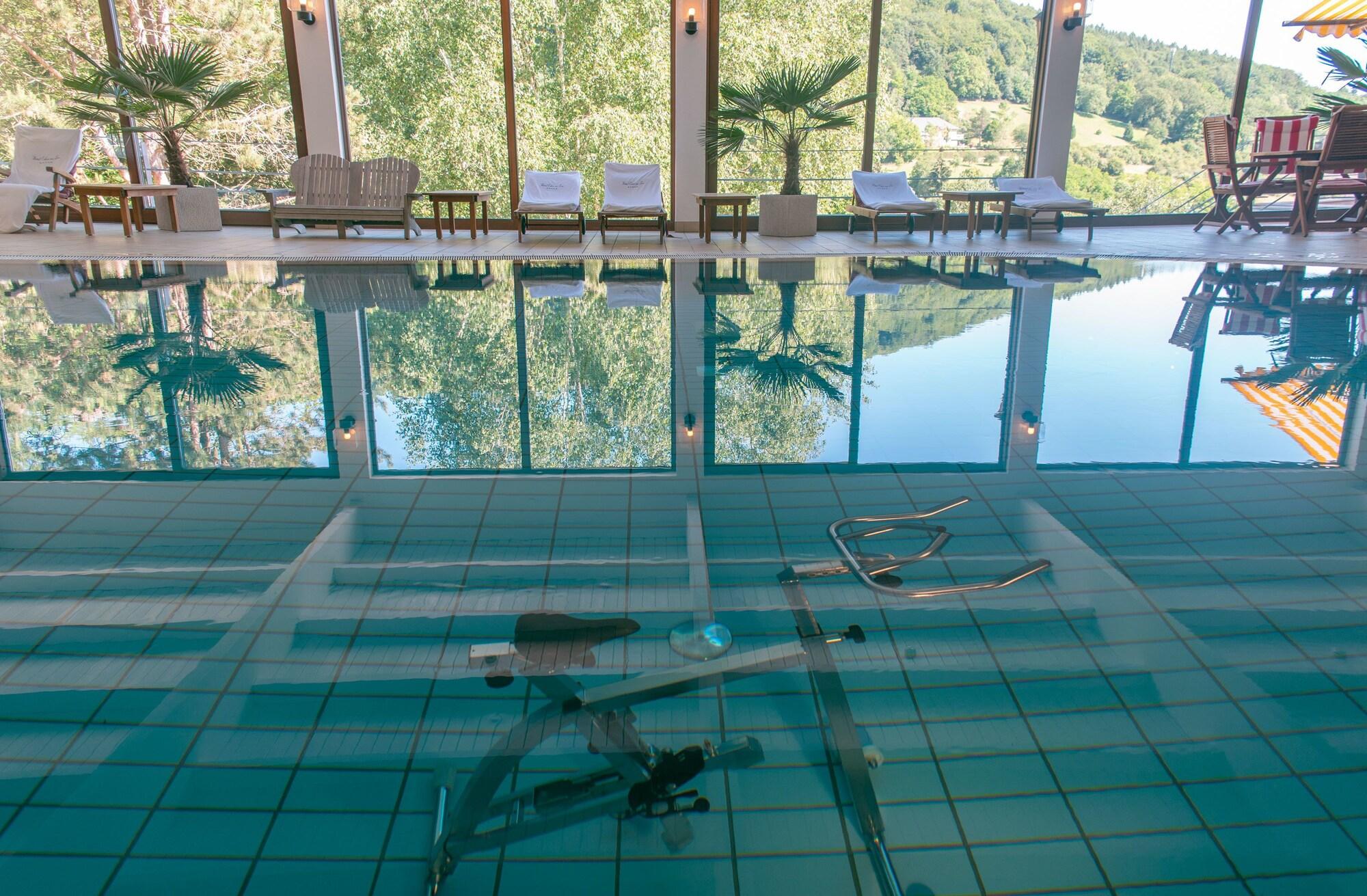 Vista Piscina Hôtel Eden au Lac