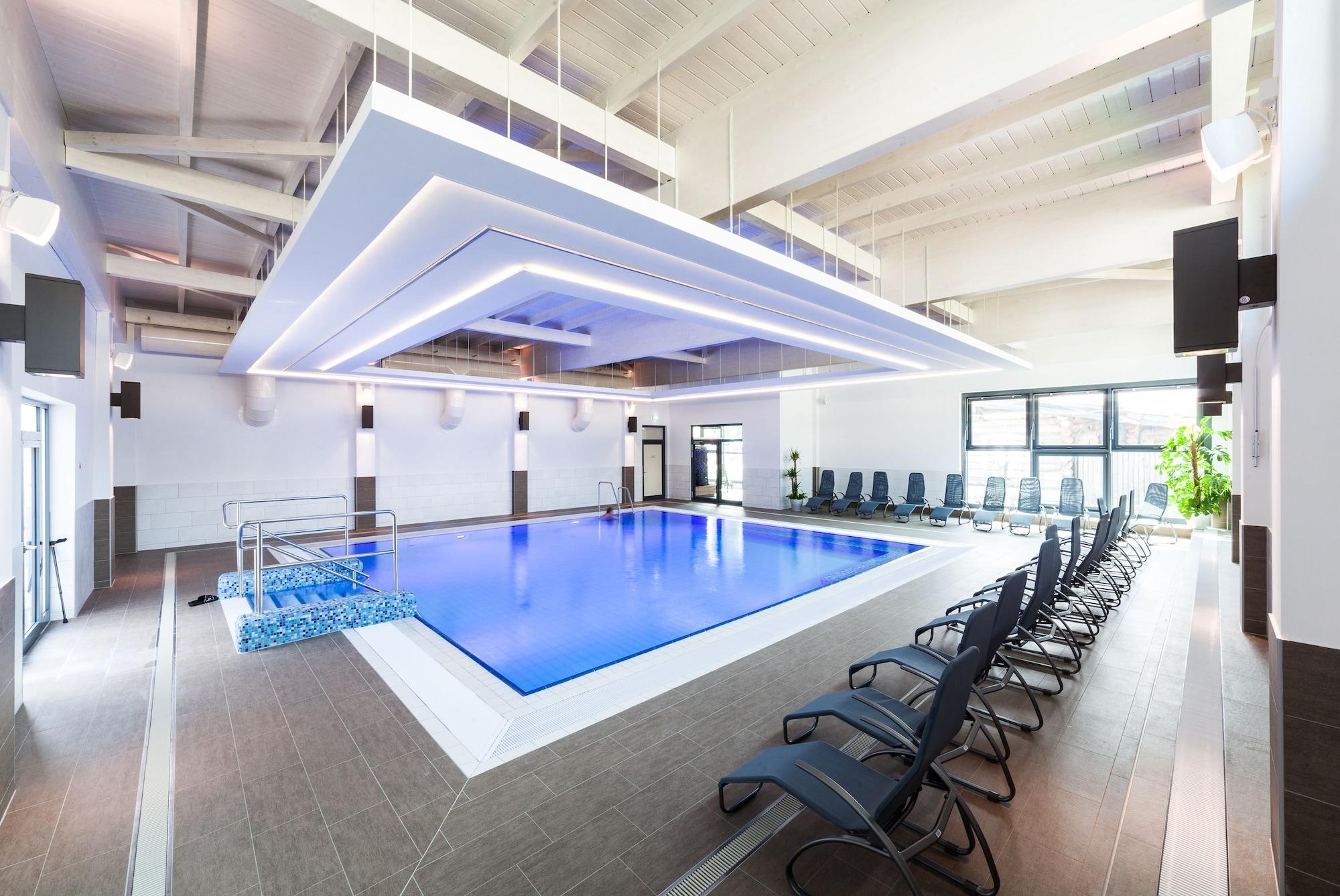 Vista Piscina Trixi Park - Ferienhäuser, Hotel und Camping