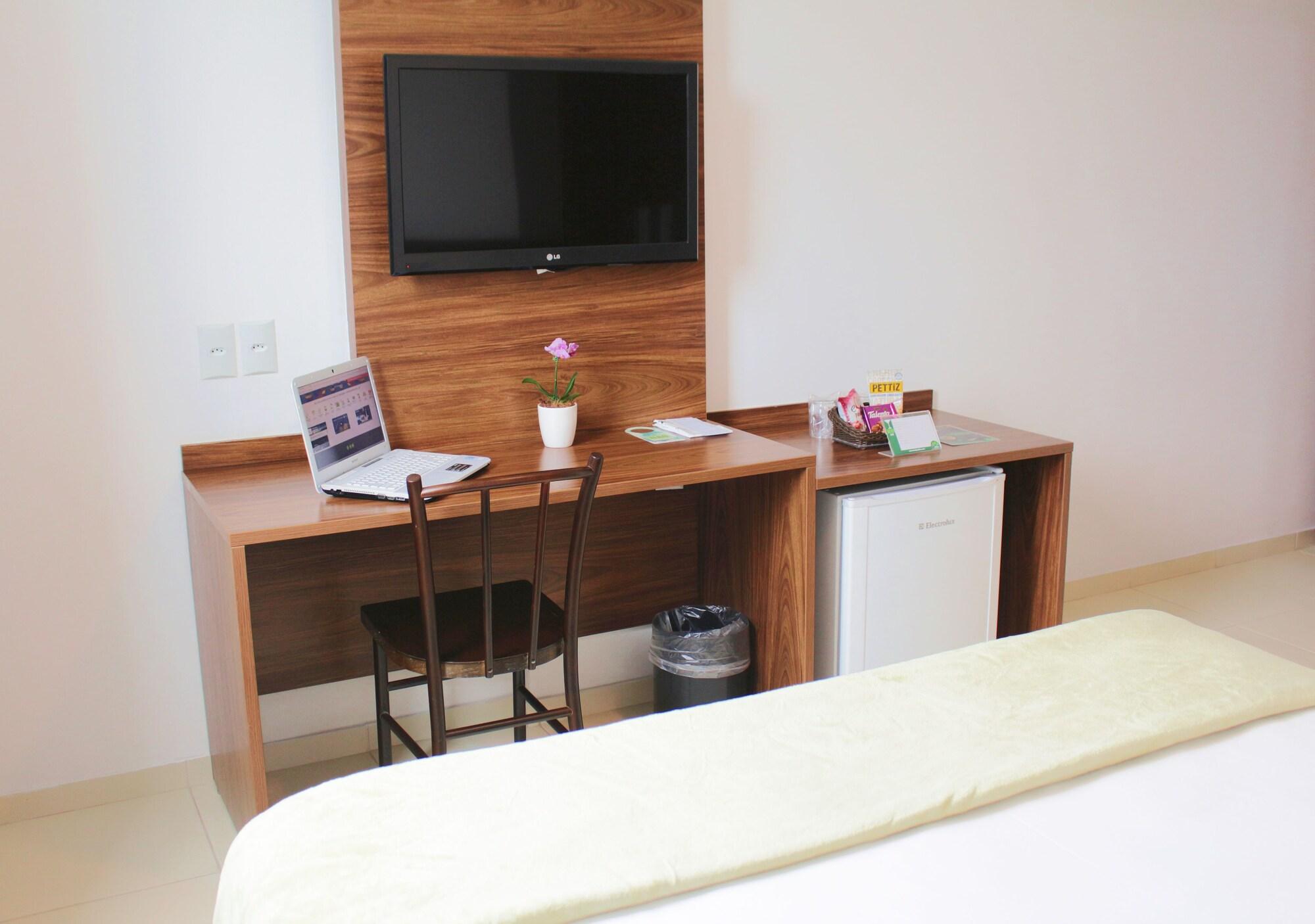 Quarto Hotel Jardins