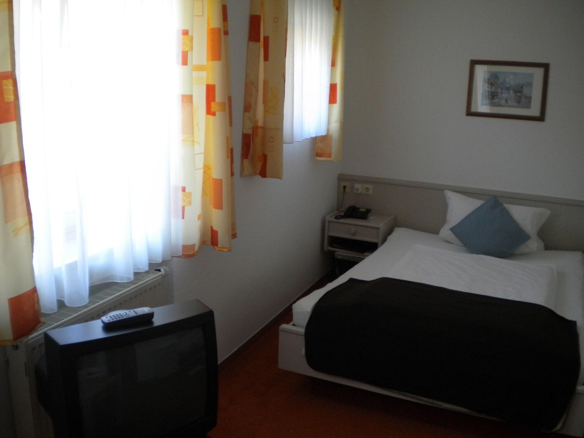Habitación Hotel Garni