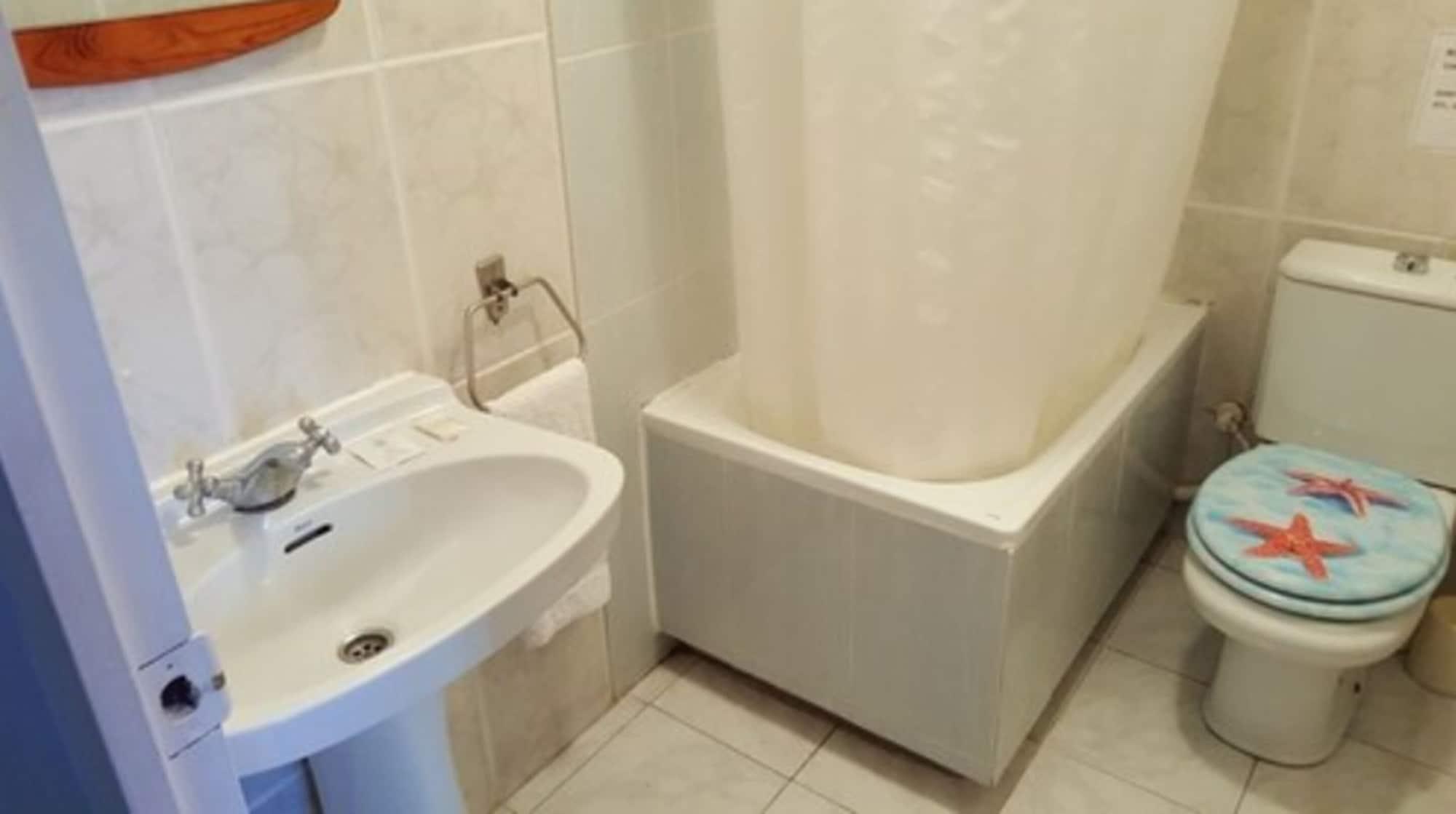 Equipamiento de Habitación Hostal Parisien