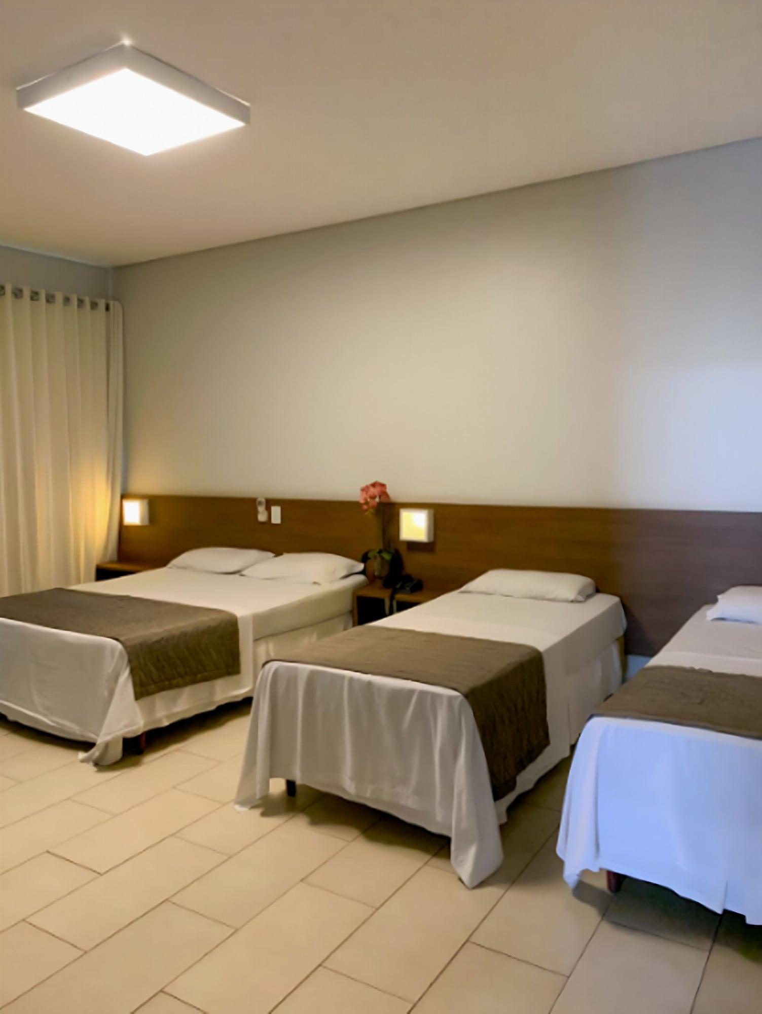 Quarto Oasis Hotel
