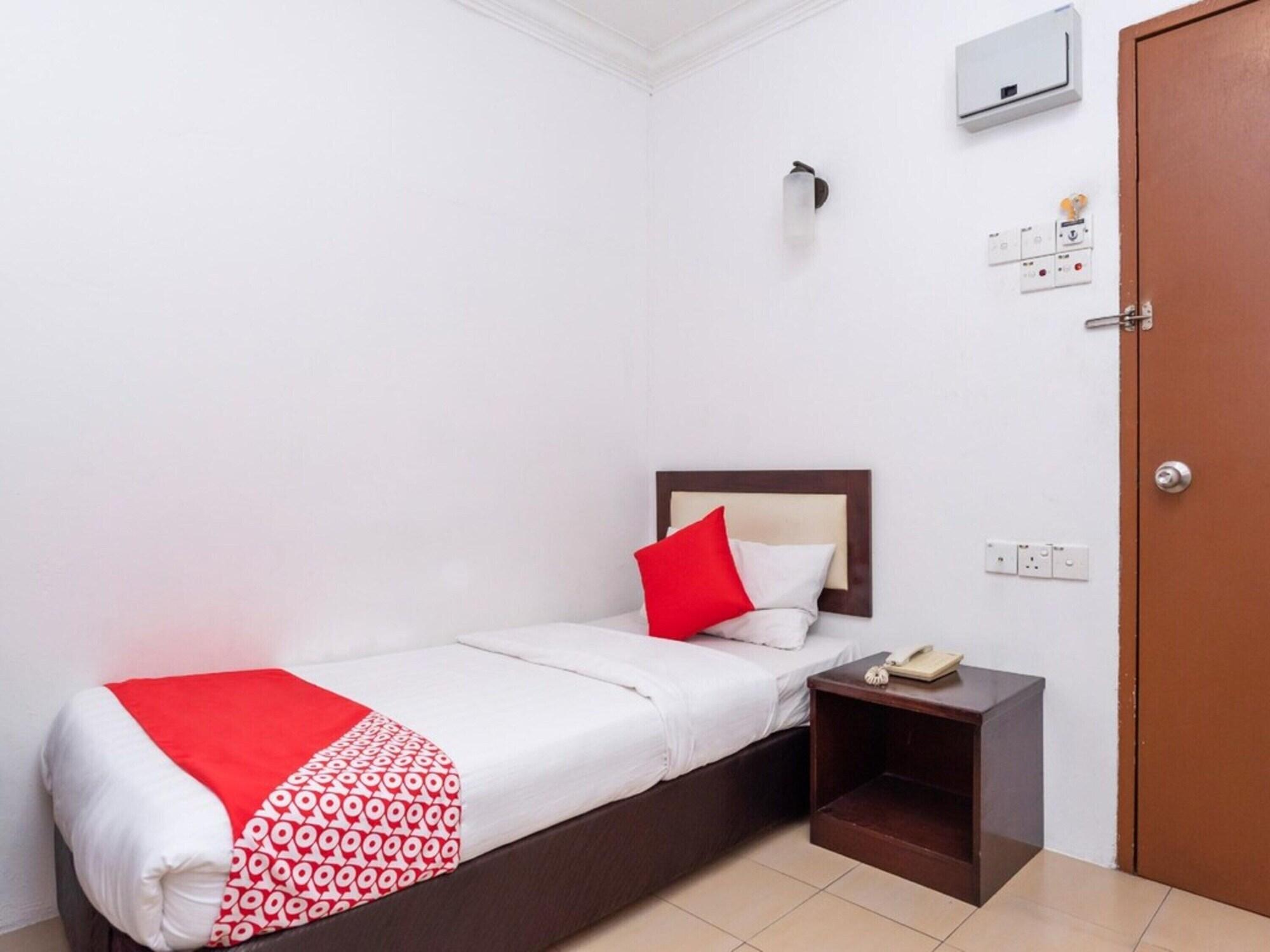 Habitación OYO 90742 I-home Hotel