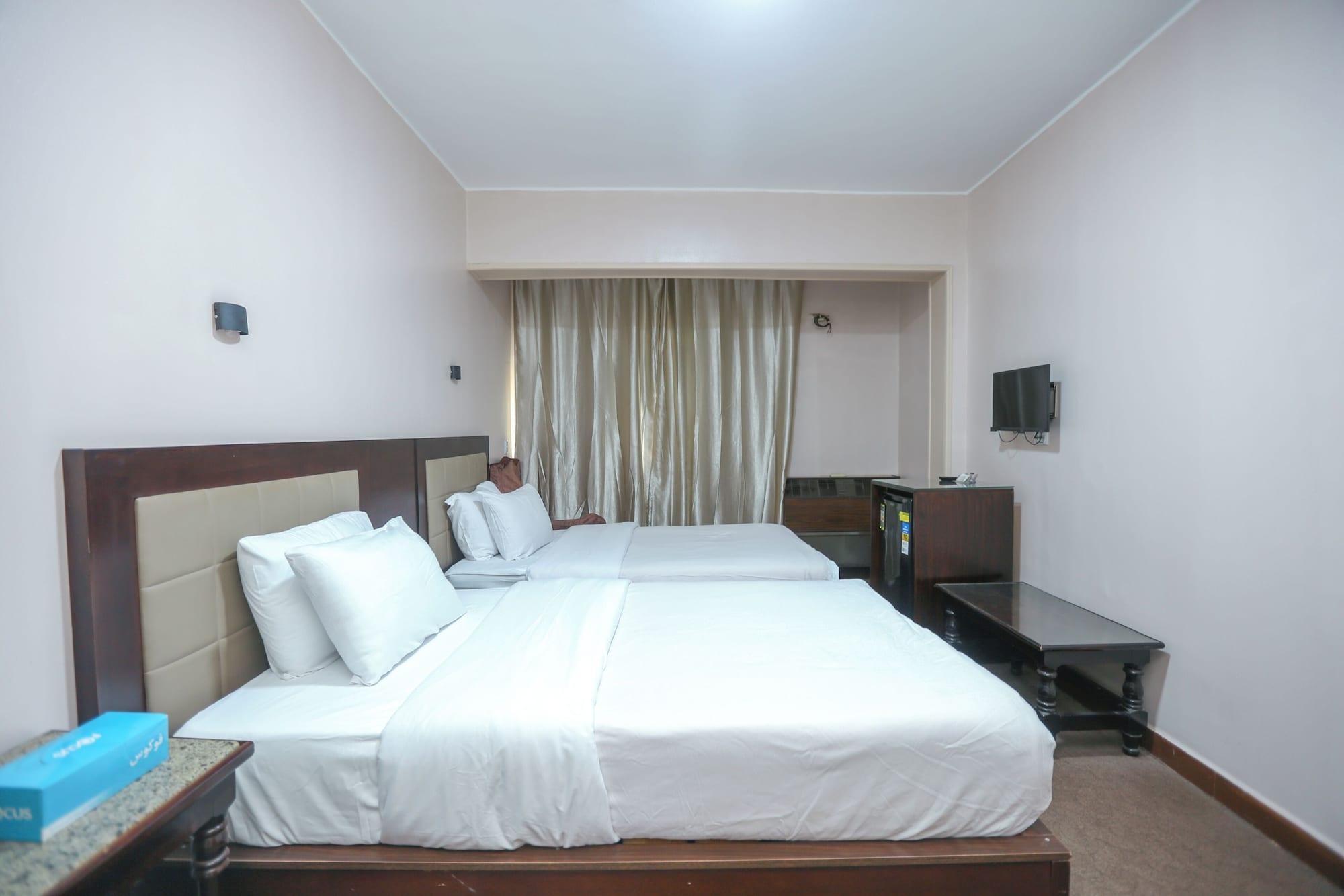 Habitación Guardian Guest House