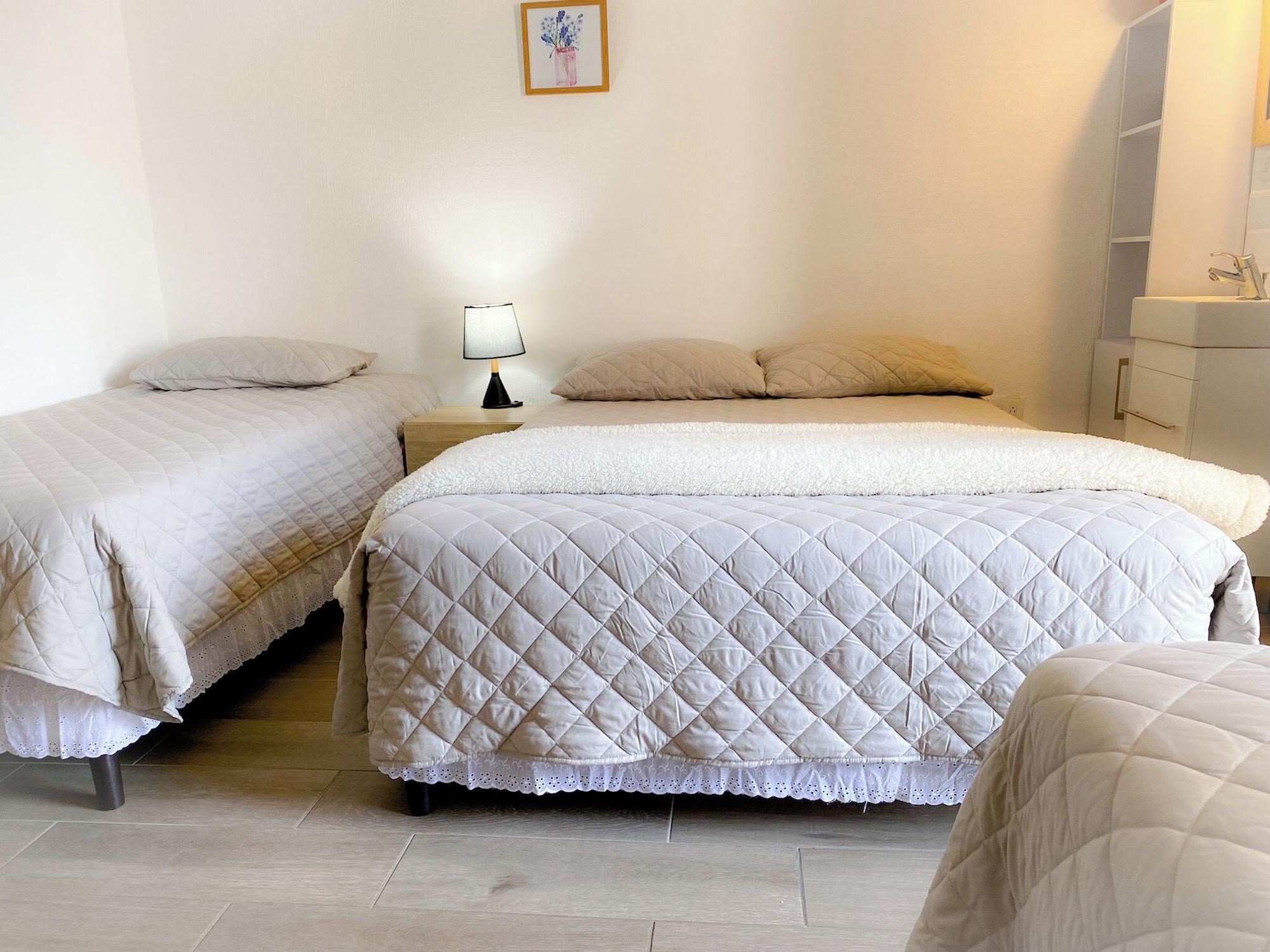 Habitación FAMILY INN ZONA 12