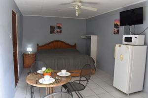 Renta temporal - Island Charm studio with king bed in Oranjestad