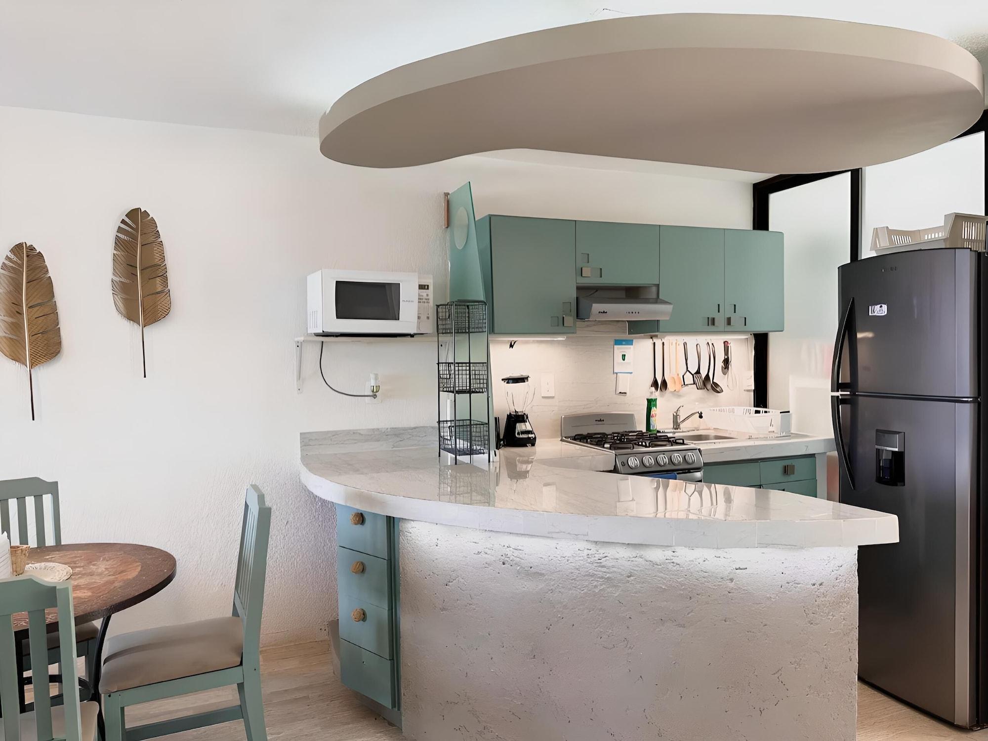 Equipamiento de Habitación Beachfront and Ocean View Apartment