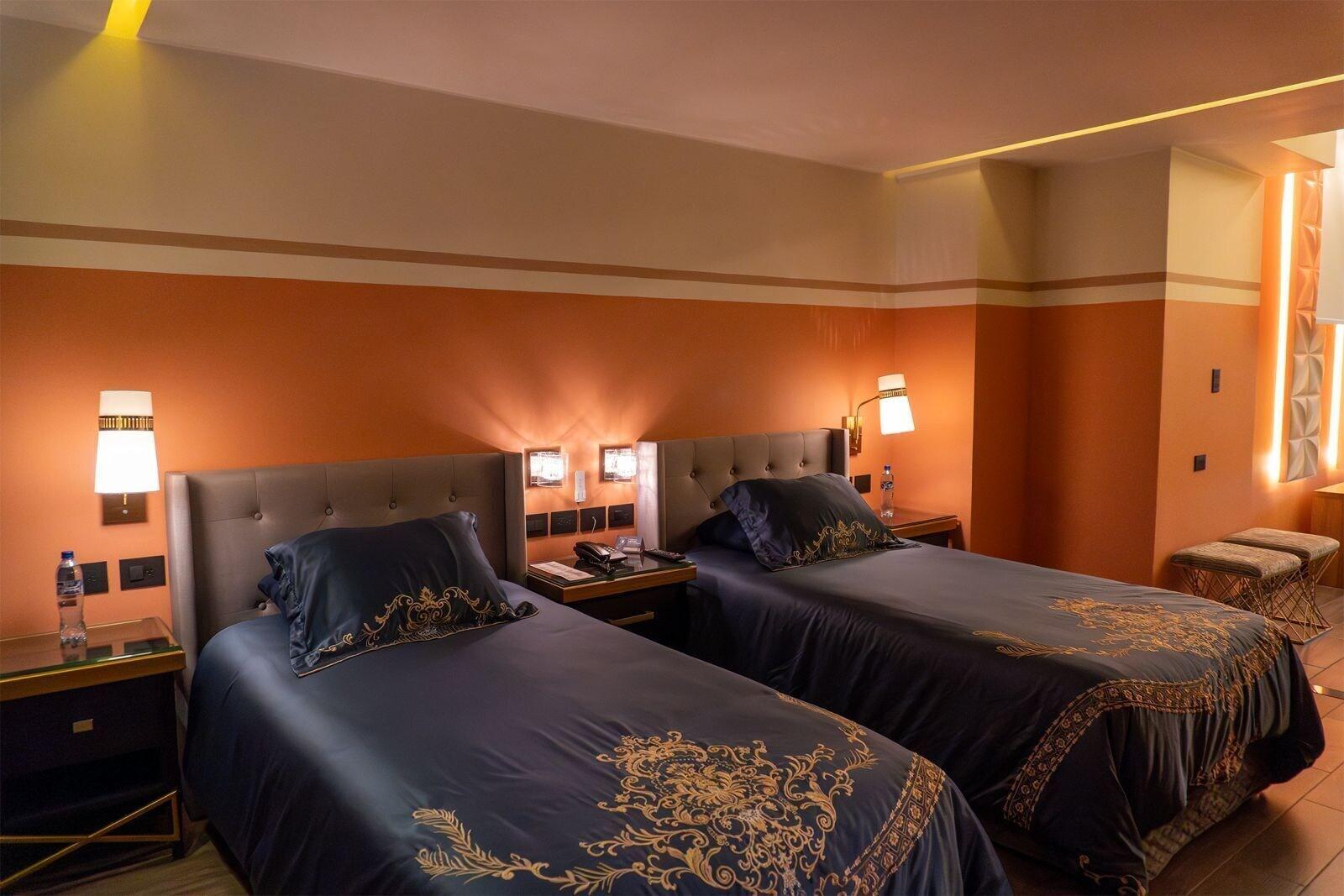 Habitación Hotel Palmera Dorada