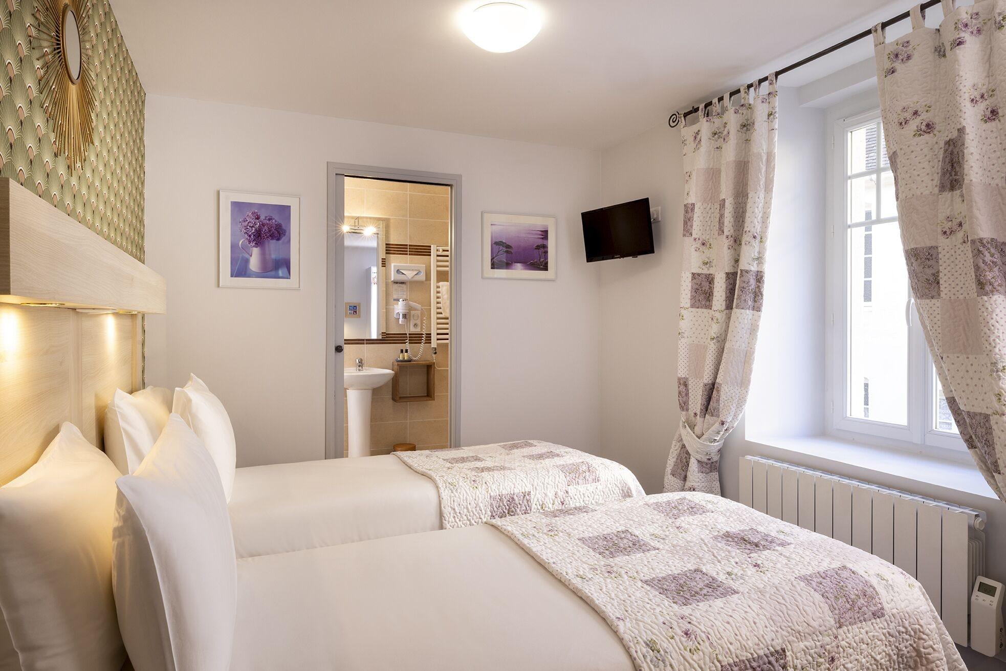 Habitación Hôtel de Lion sur Mer
