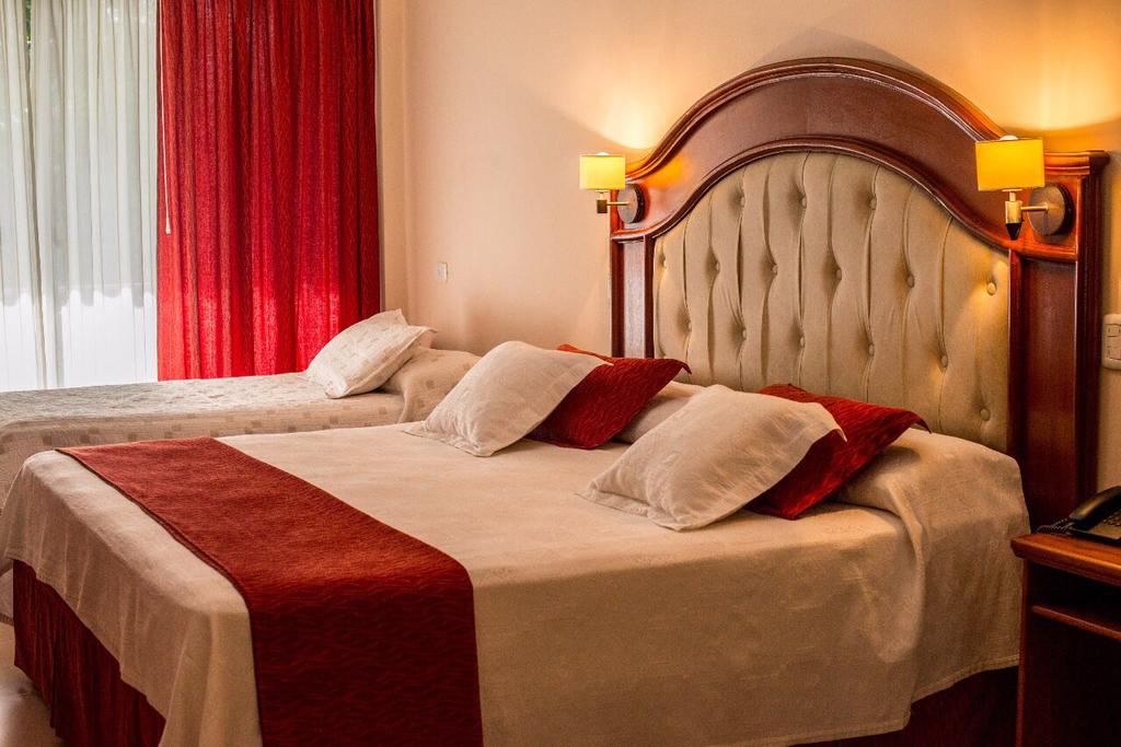 Habitación Grand City Hotel