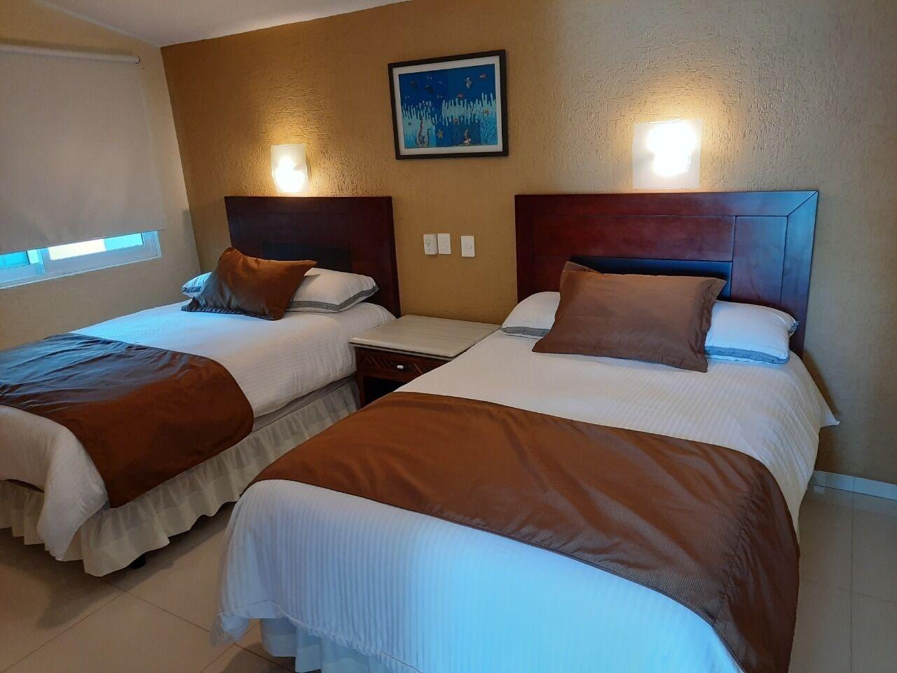 Habitación Suites Costa Dorada