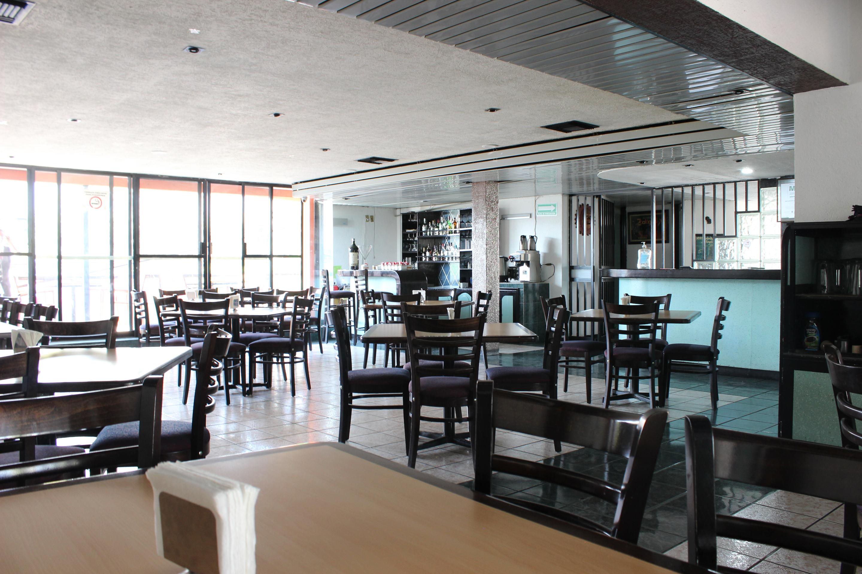 Restaurant Capital O Hotel Flamingo