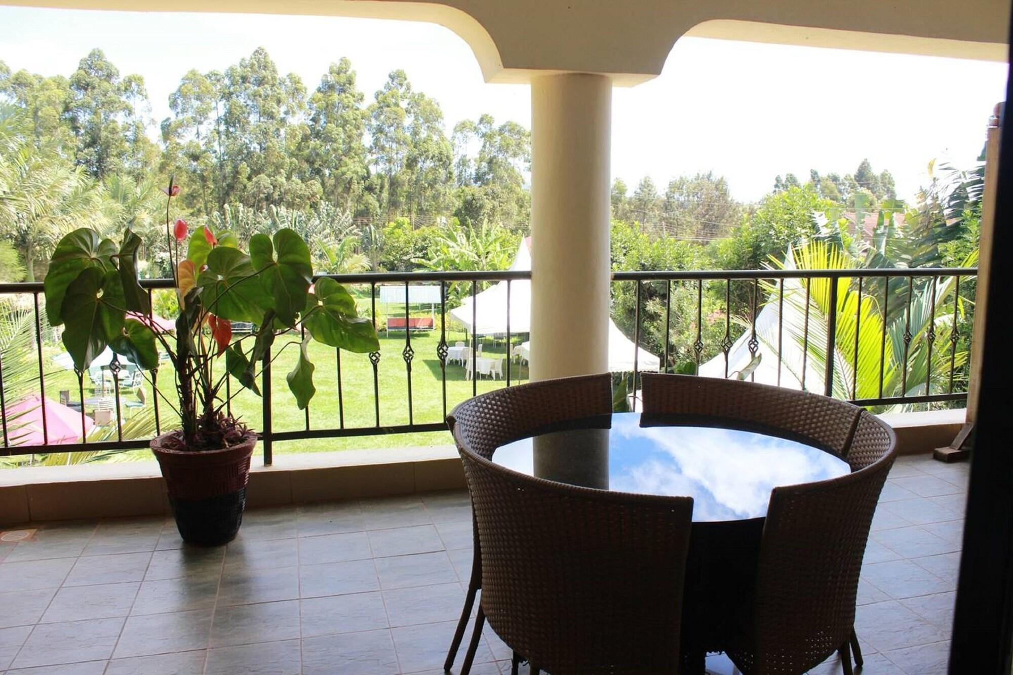 Bar/Salón Gatimene Gardens Hotel