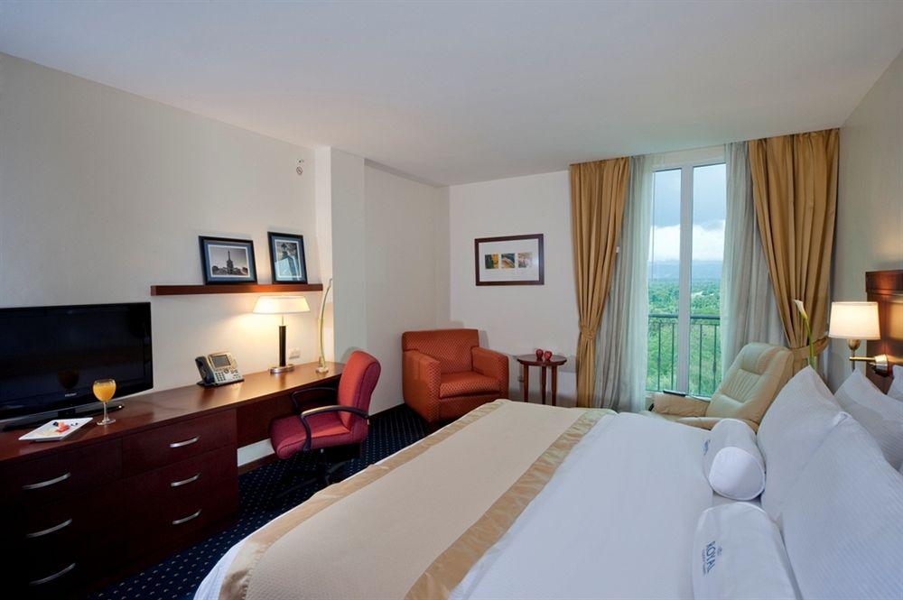 Habitación Hodelpa Garden Court