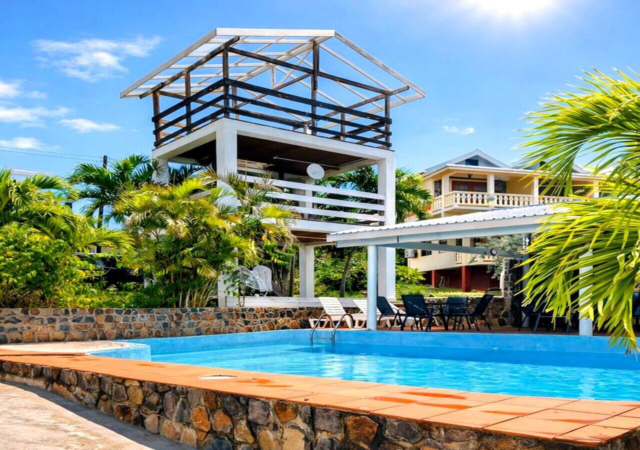 Vista Piscina Dennis' Hideaway