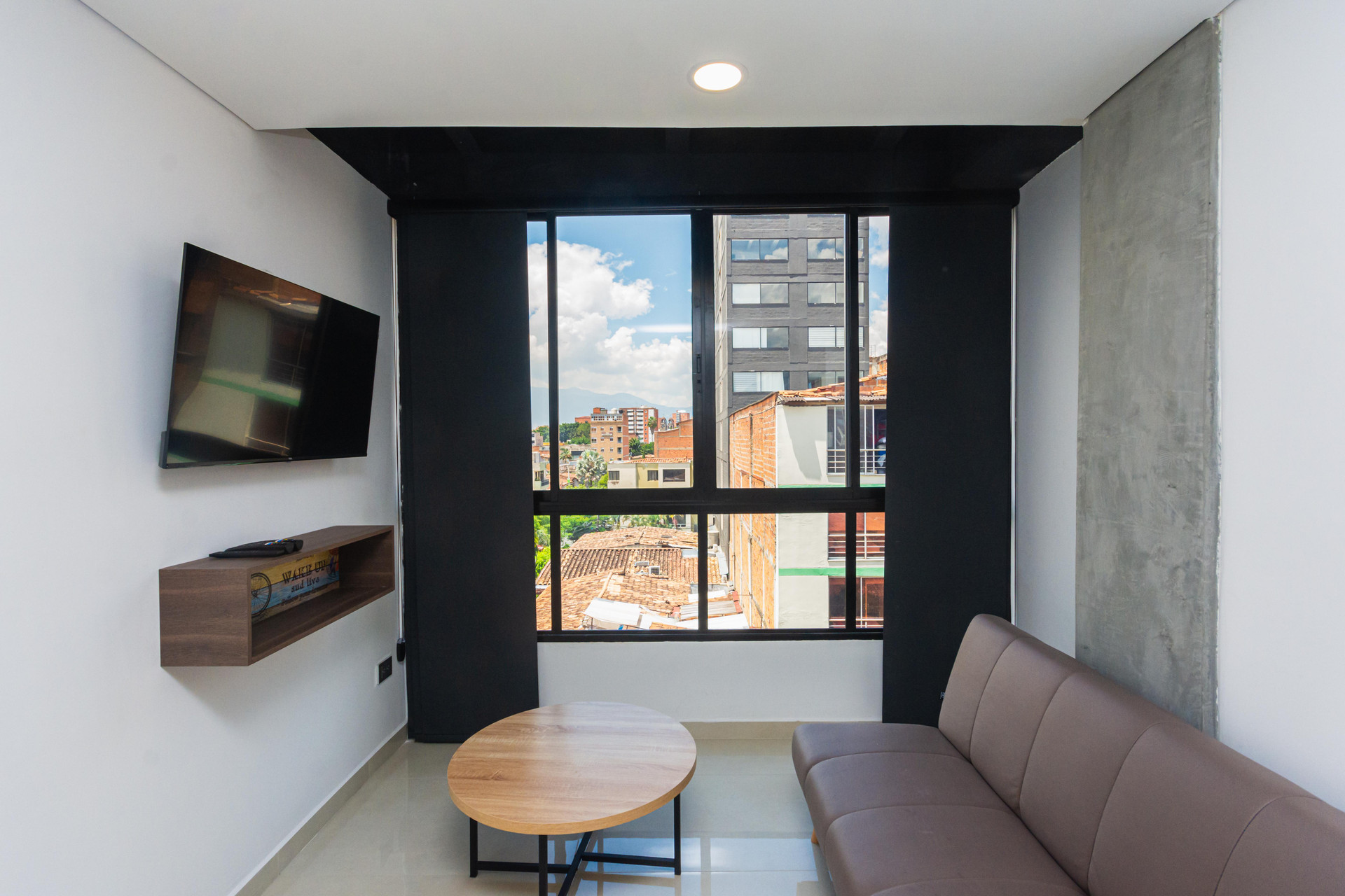Zona de estar Hotel Distrito 70 Living