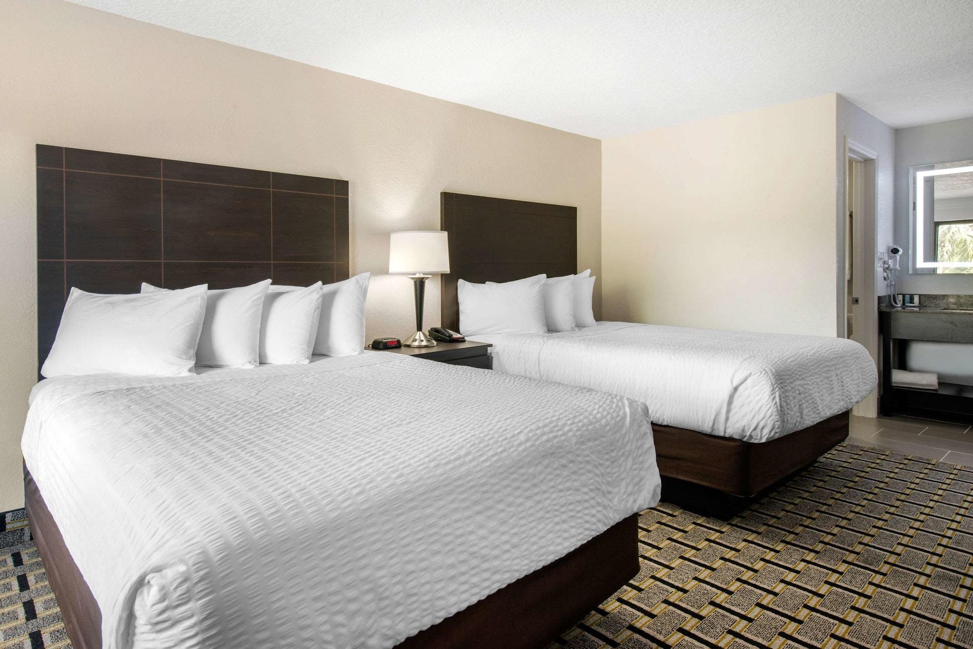 Quarto Clarion Inn & Suites Kissimmee-Lake Buena Vista South