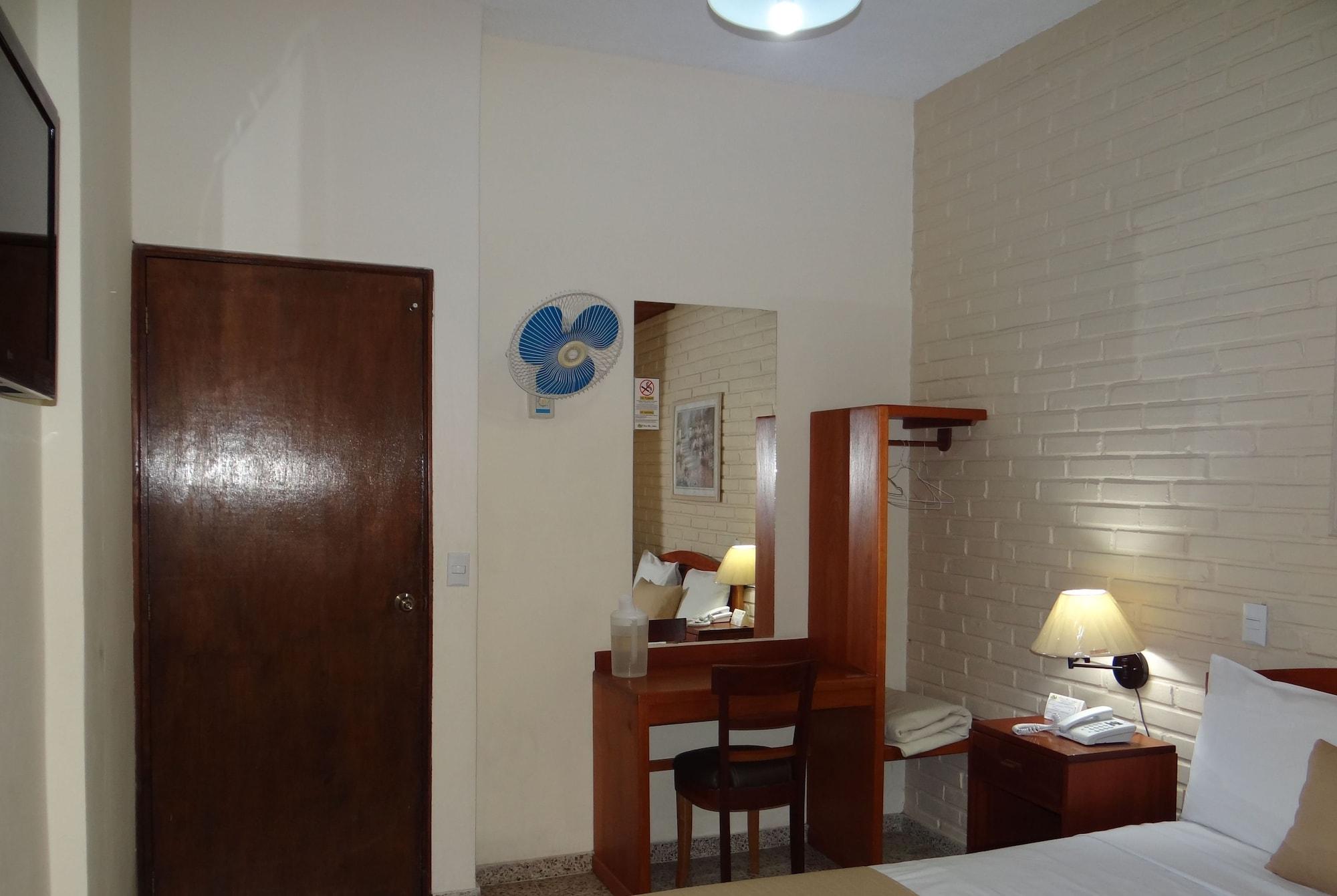 Habitación Hotel Mac Arthur