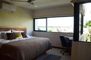Alquiler Vacacional - Charming 1-Bedroom Apartment in Río Lagartos. AC, Rooftop Deck & Private Pier -F