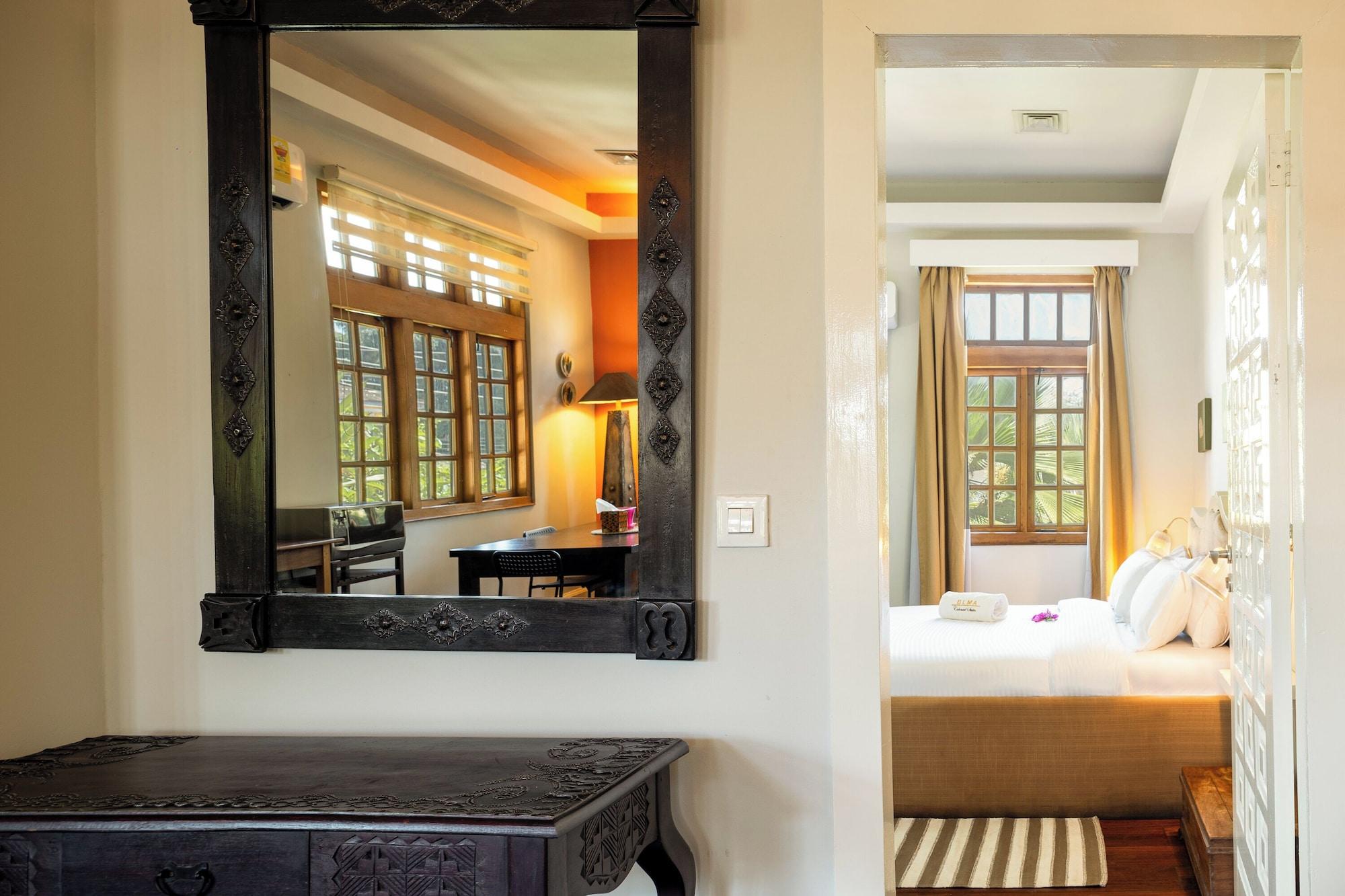 Habitación Olma Colonial Suites