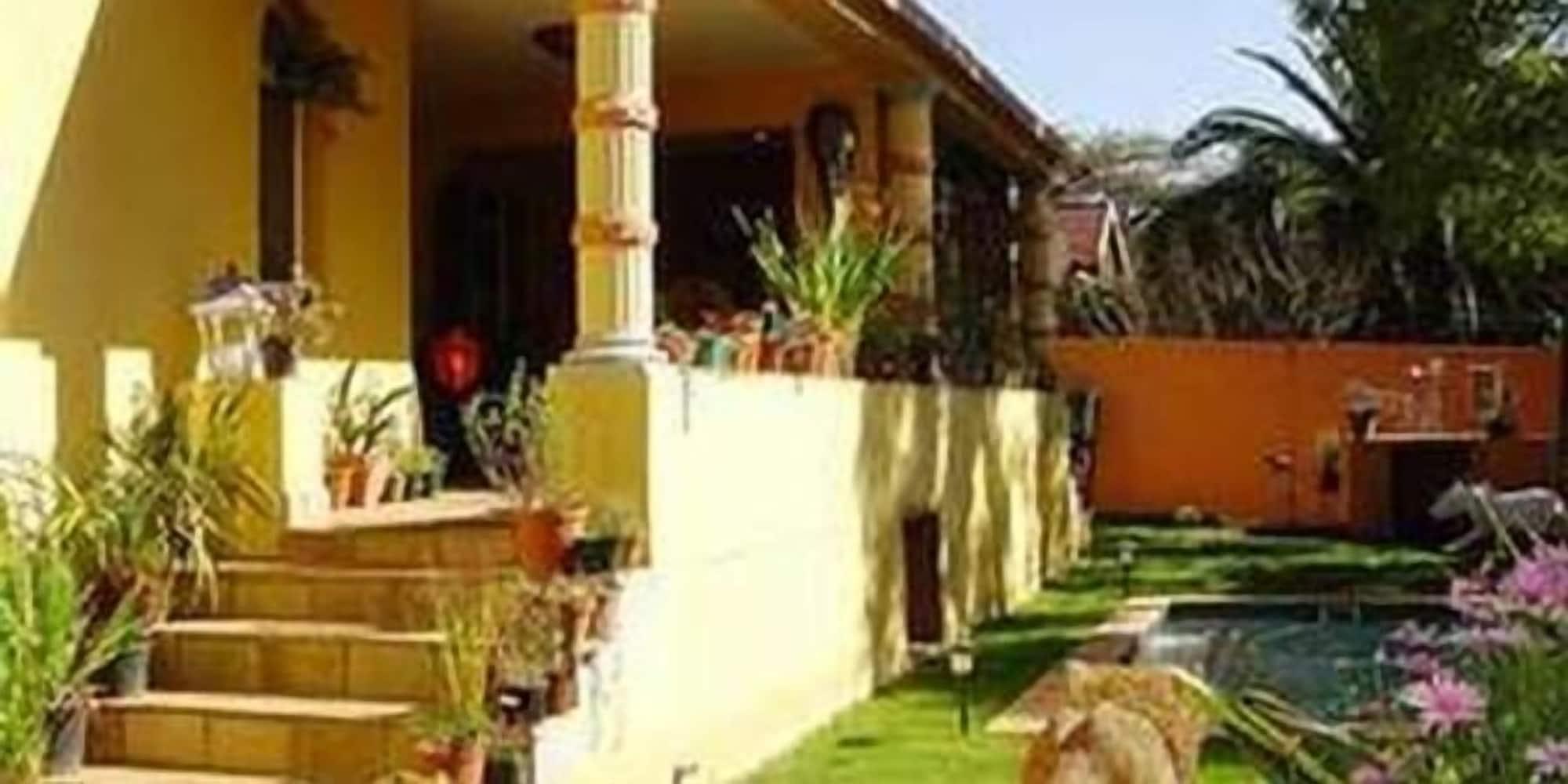 Vista Exterior Sleepy Gecko Guest House