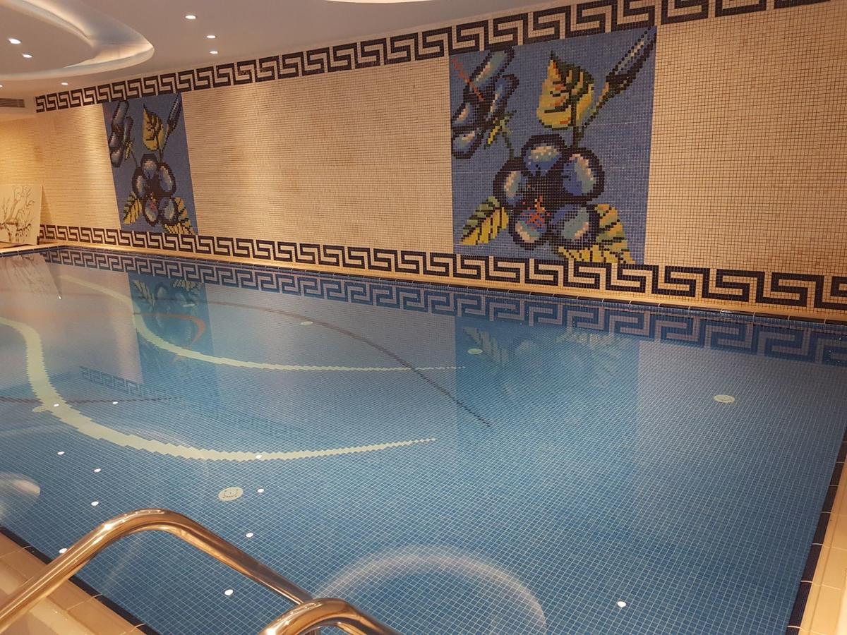 Vista Piscina Al Mansour Suites Hotel