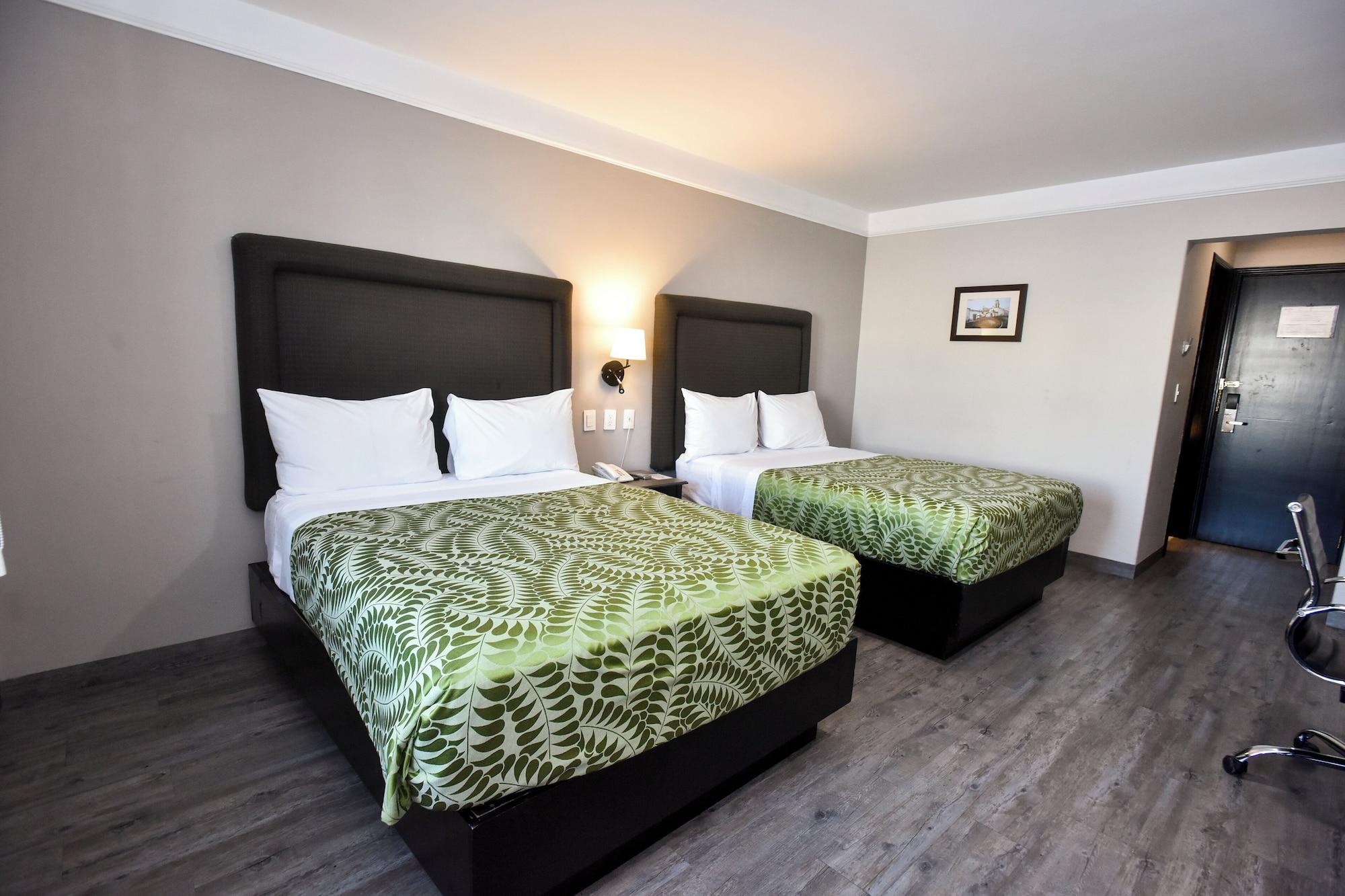 Habitación Plaza Camelinas Hotel