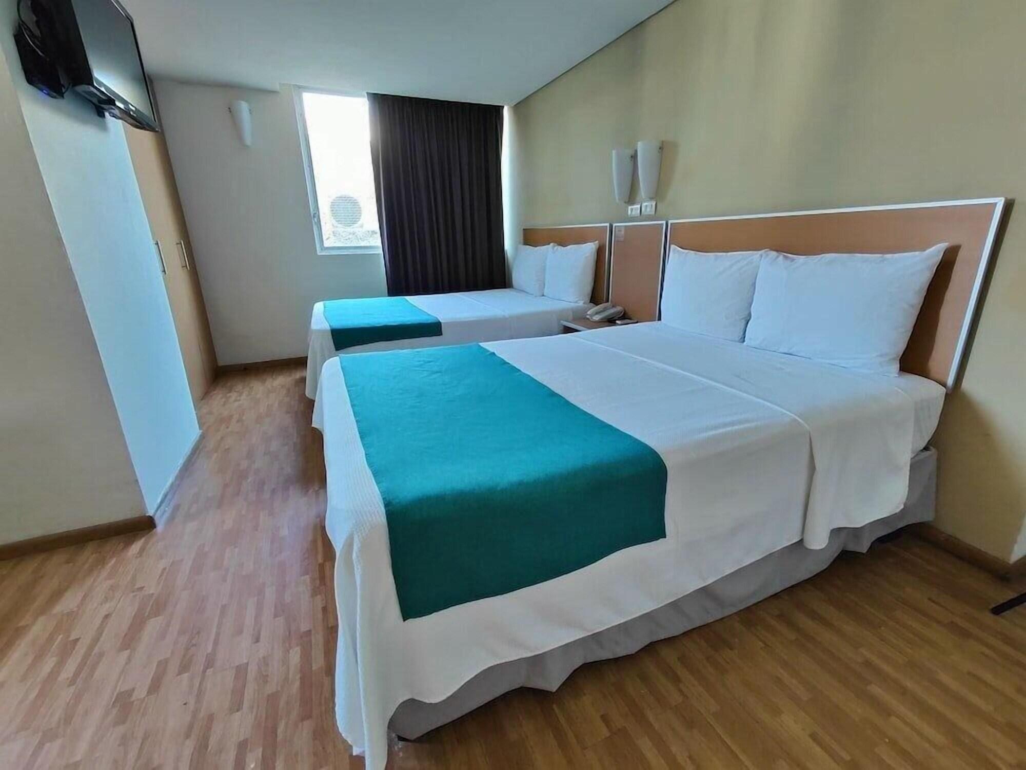 Habitación Kasa Hotel & Suites