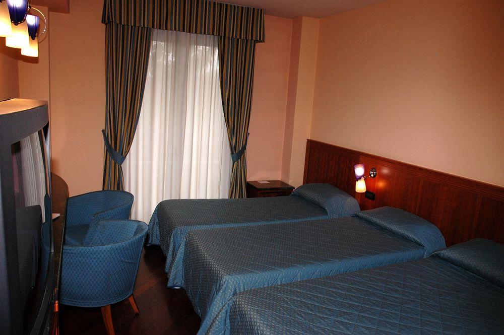 Habitación Hotel Michelangelo Palace