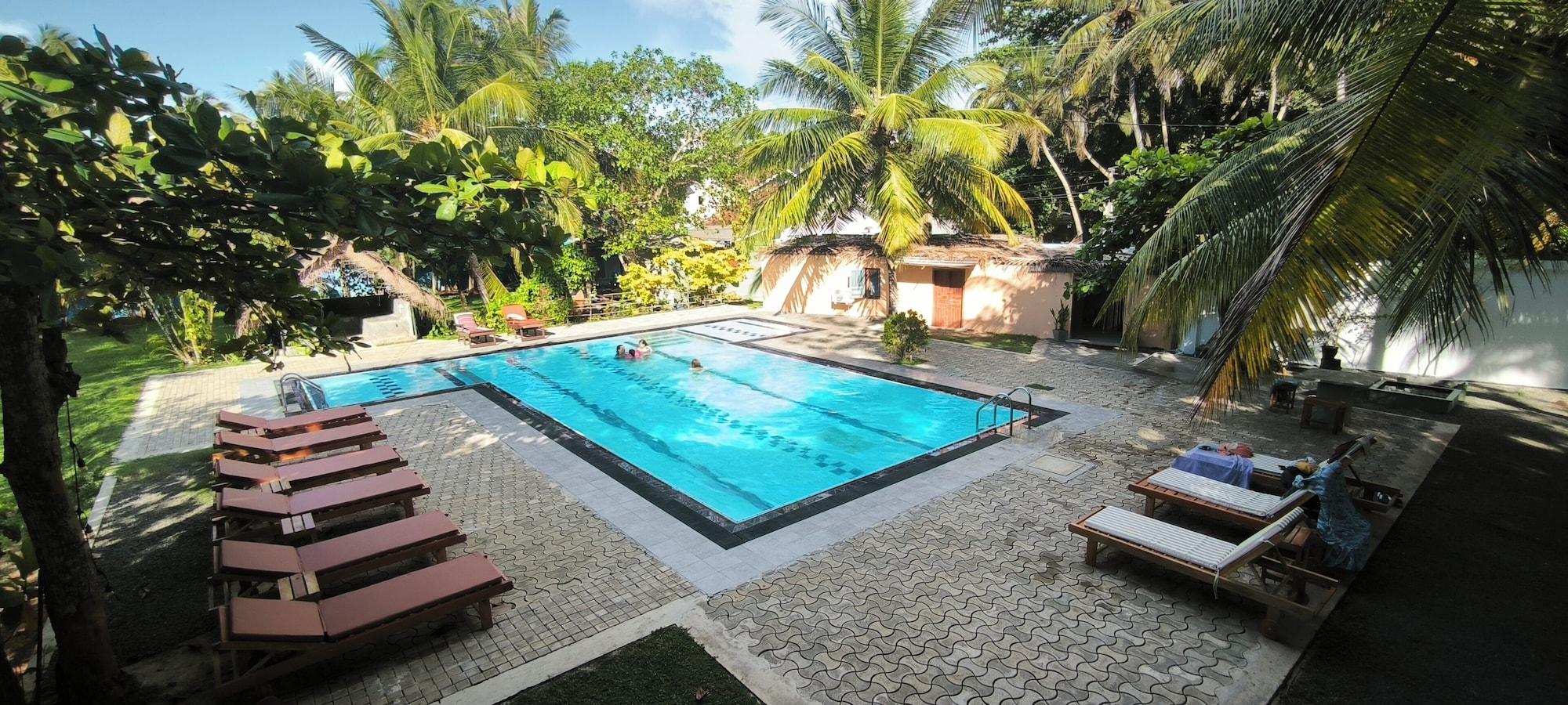Vista Piscina Papaya Hikkaduwa