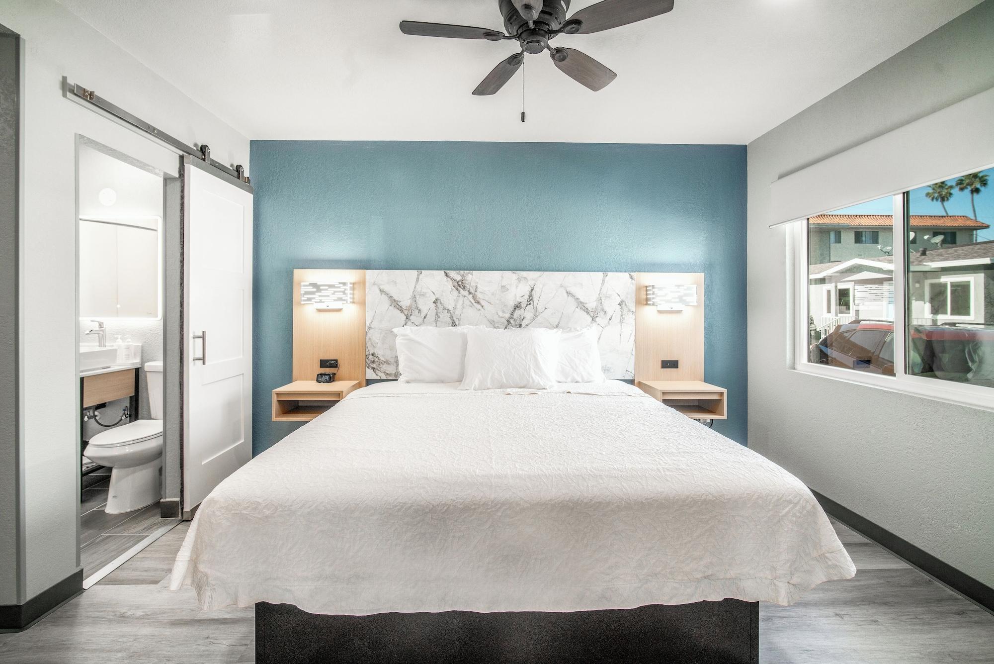 Habitación Pacific Inn & Suites