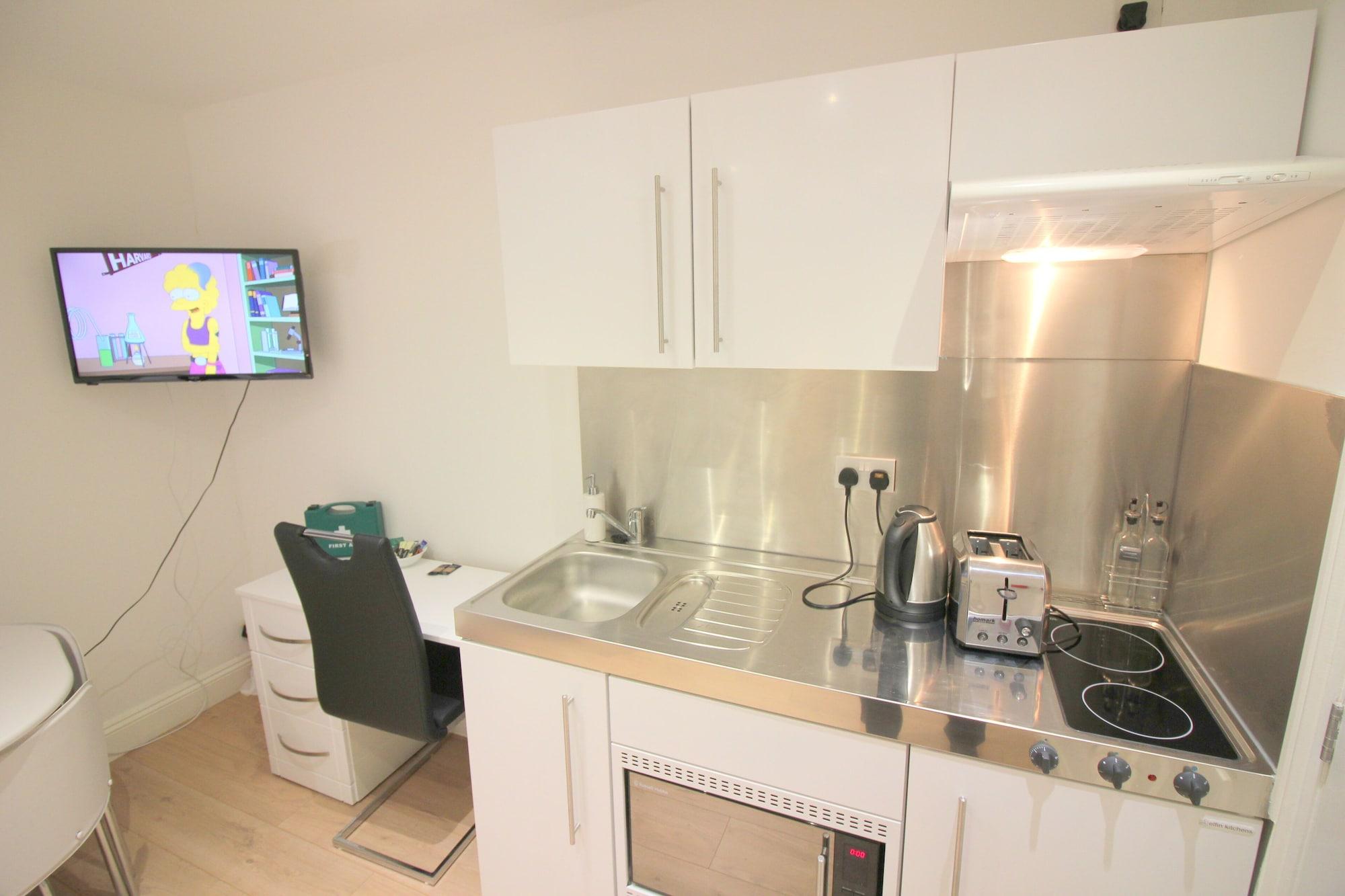 Equipamiento de Habitación Cambridge City Rooms by Paymán Club
