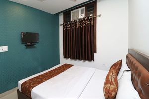Alojamiento - OYO 11648 CP Residency