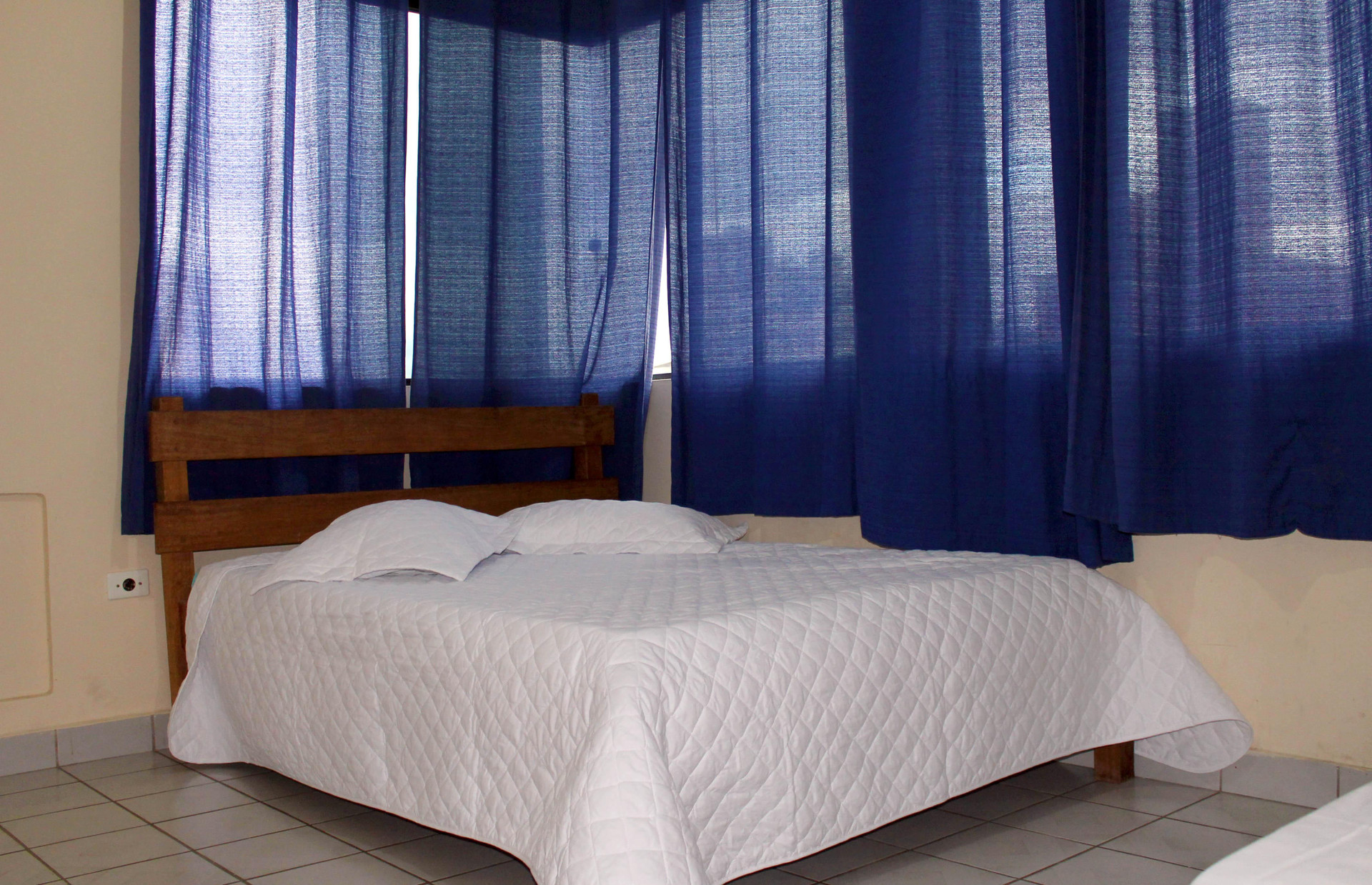 Quarto Hotel H Praia Grande