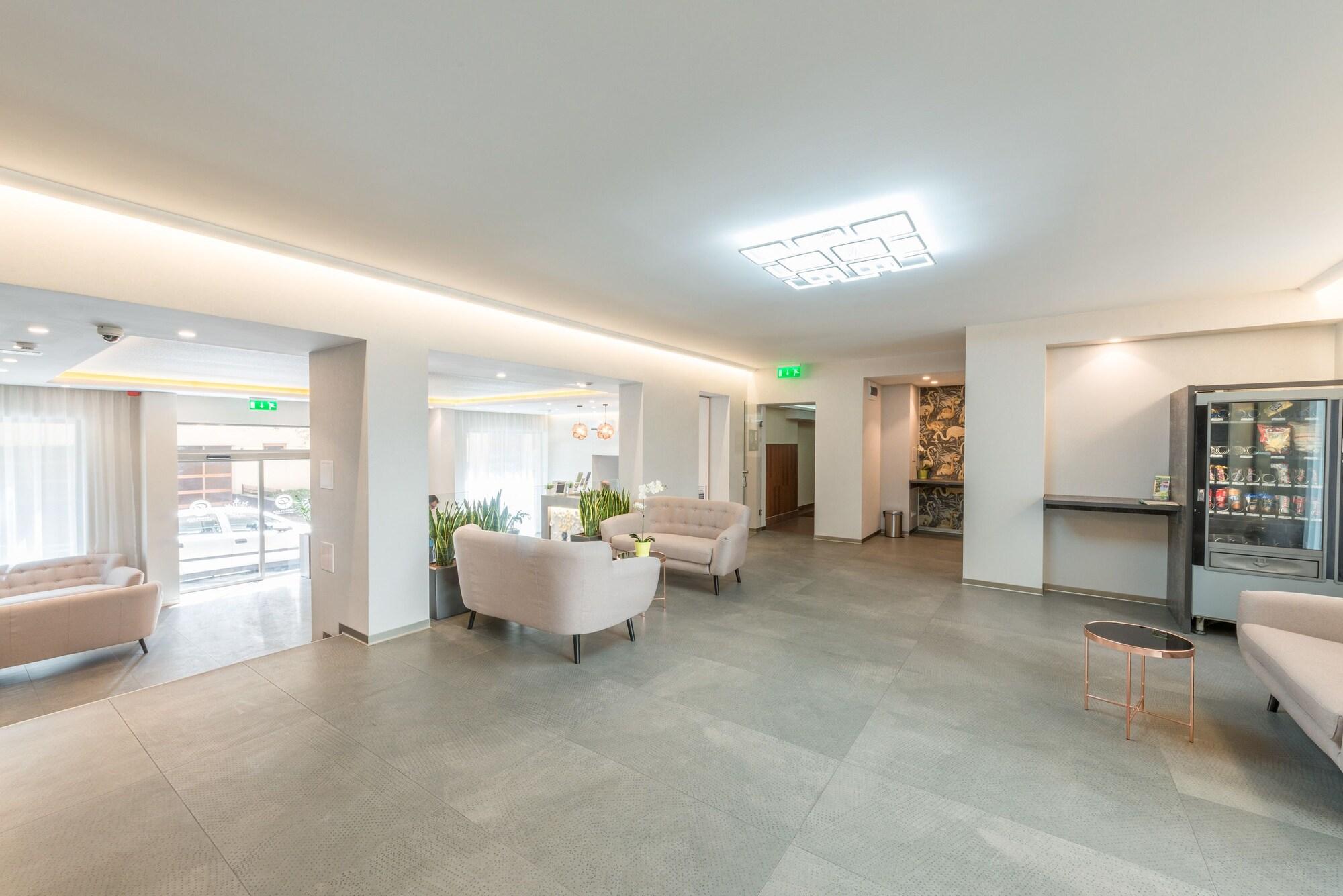 Bar/Salón Corvin Plaza Apartments and Suites