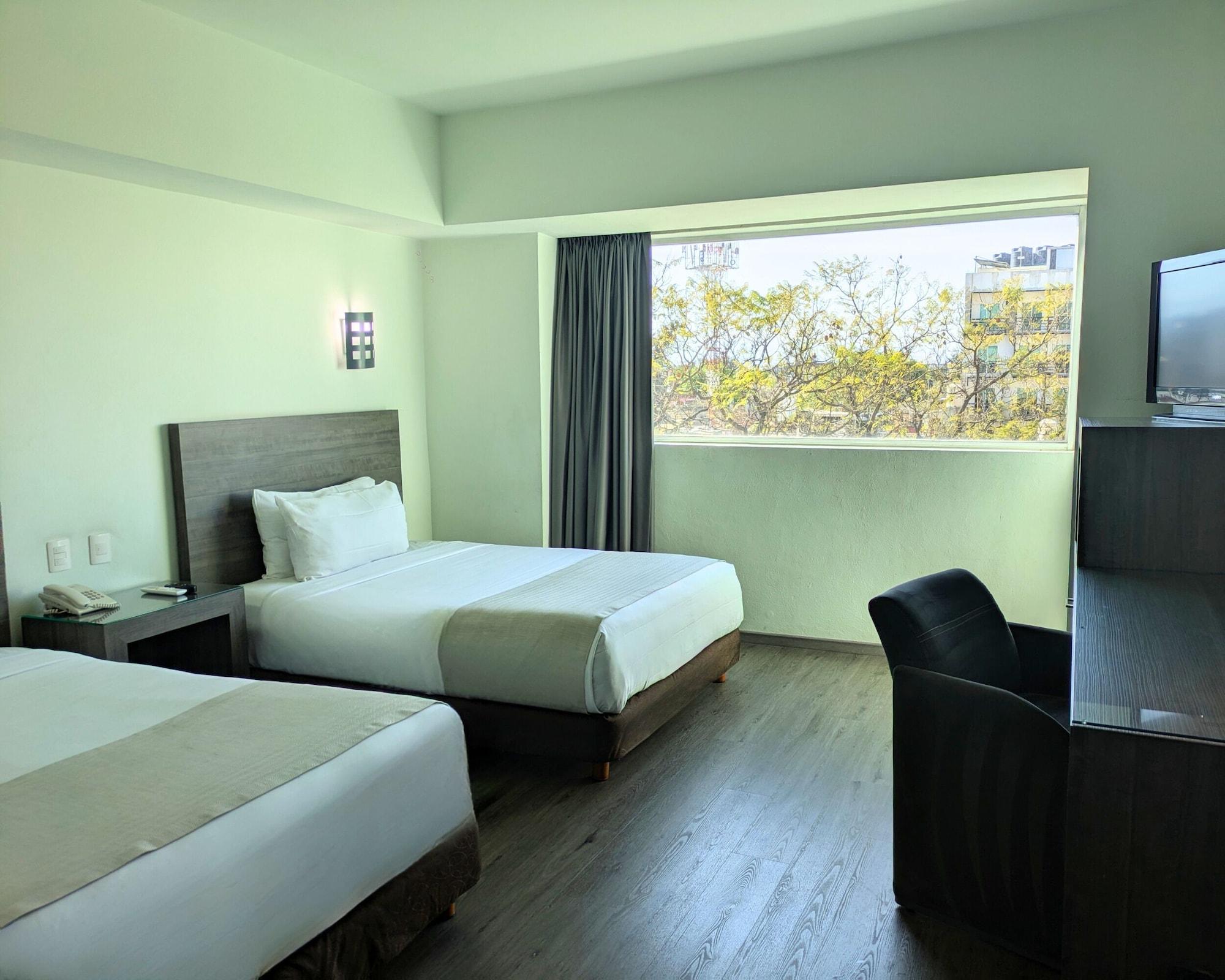 Habitación We Hotel Aeropuerto