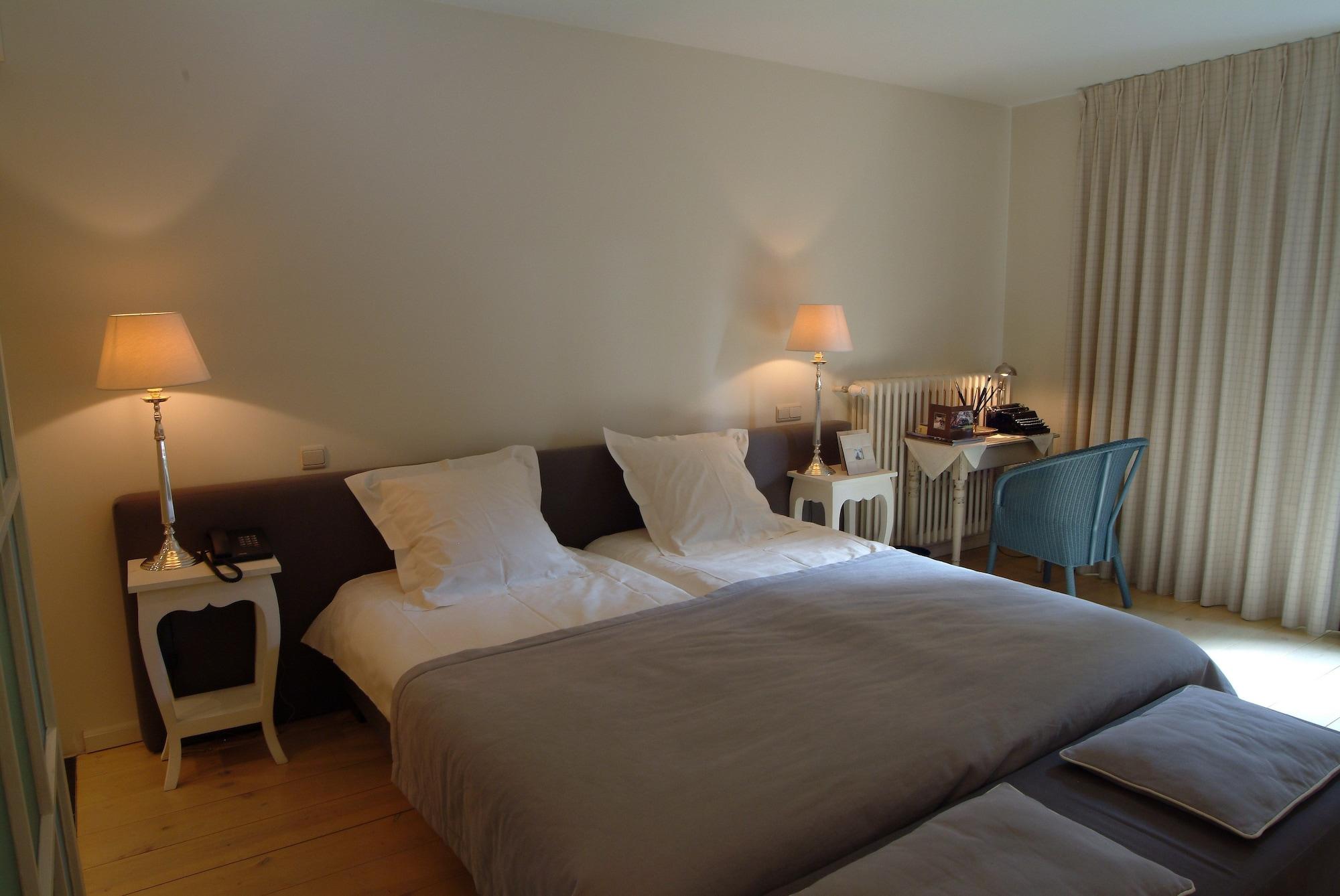Habitación Charmehotel Manoir Ogygia