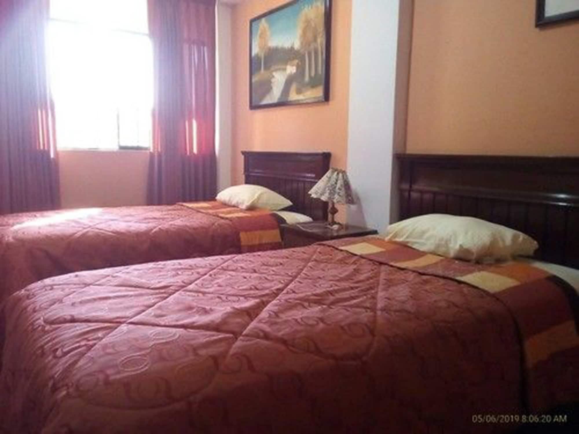 Habitación Hostal Tres Mascaras