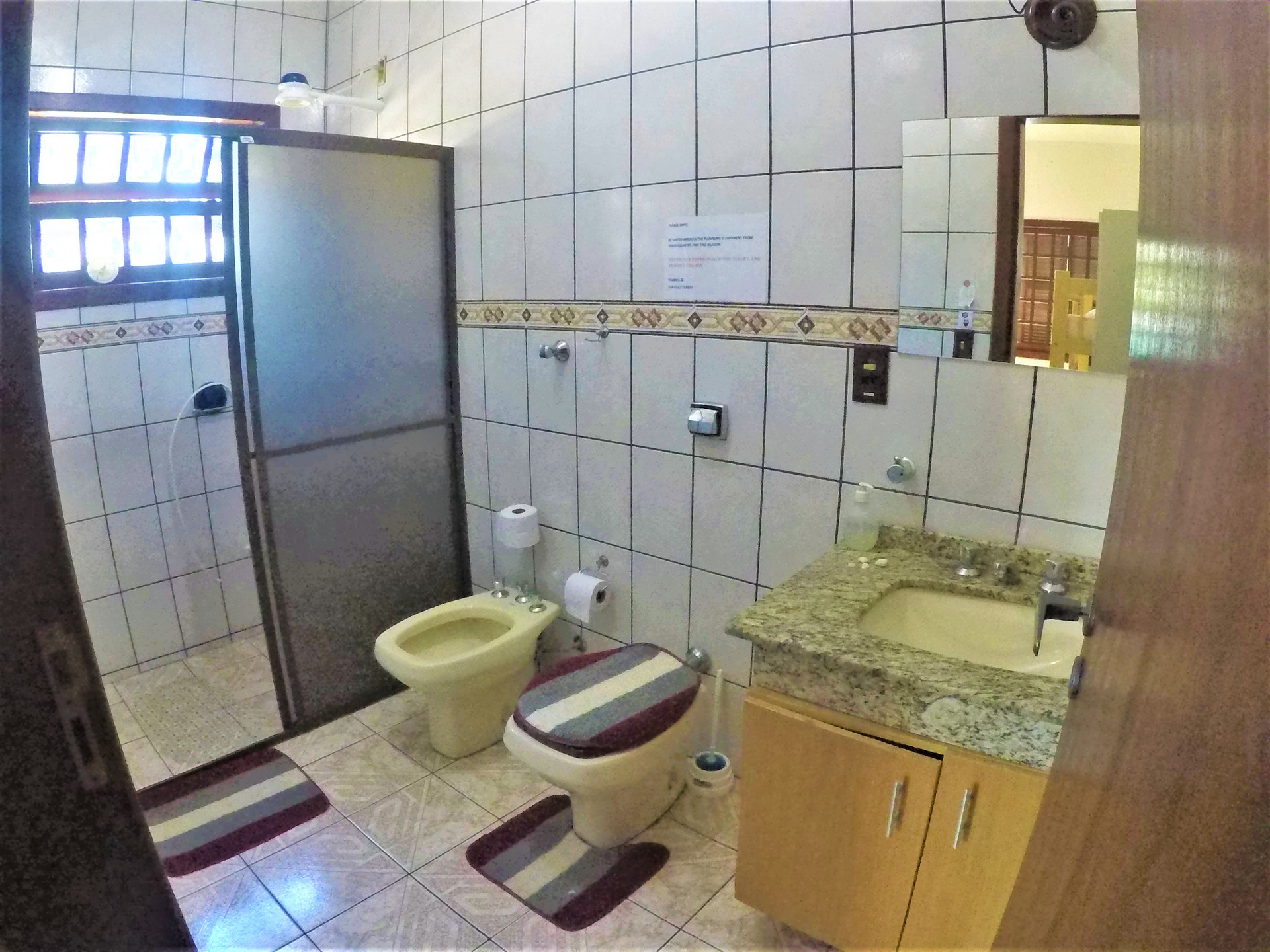 Baño About Floripa Hostel