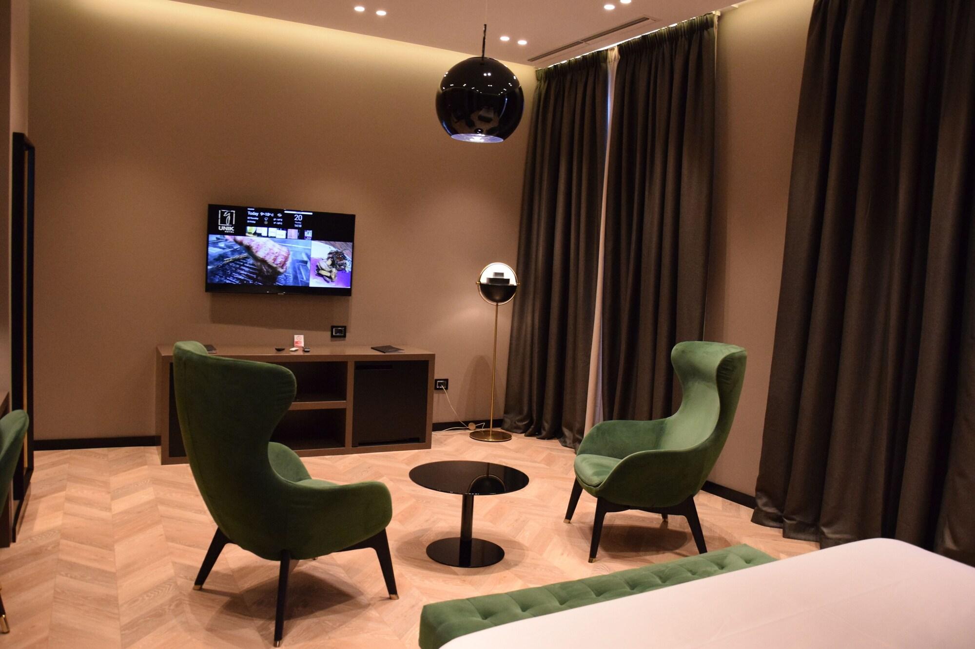 Bar/Salón Unik Hotel