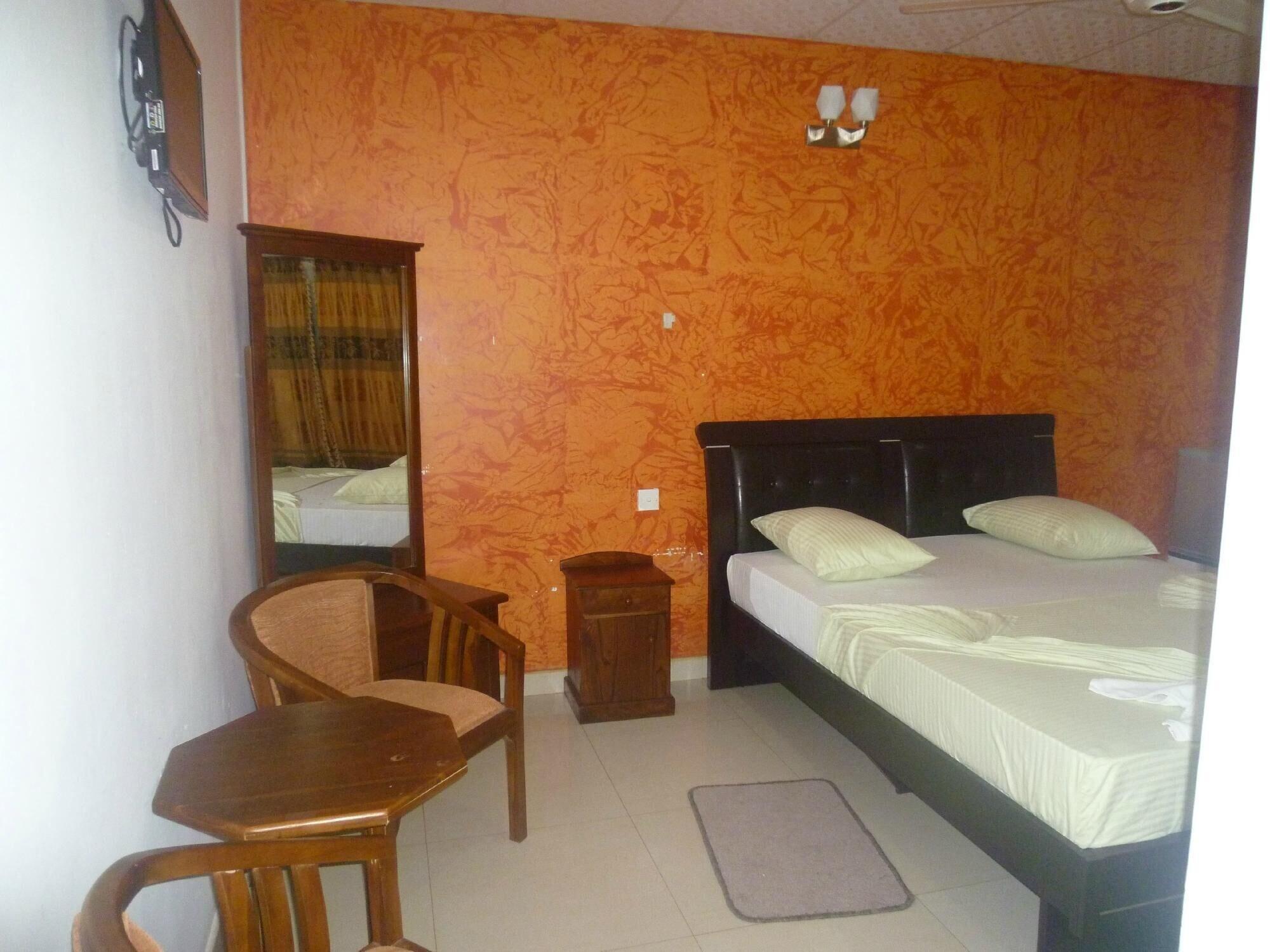 Habitación Crown Grand Hotel