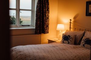 Alquiler Vacacional - Gorgeous flint cottage overlooking the marshes, walking distance to beach