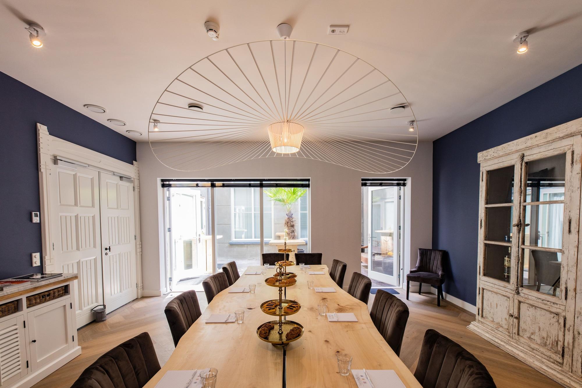 Sala de Reuniones Stadsvilla Mout