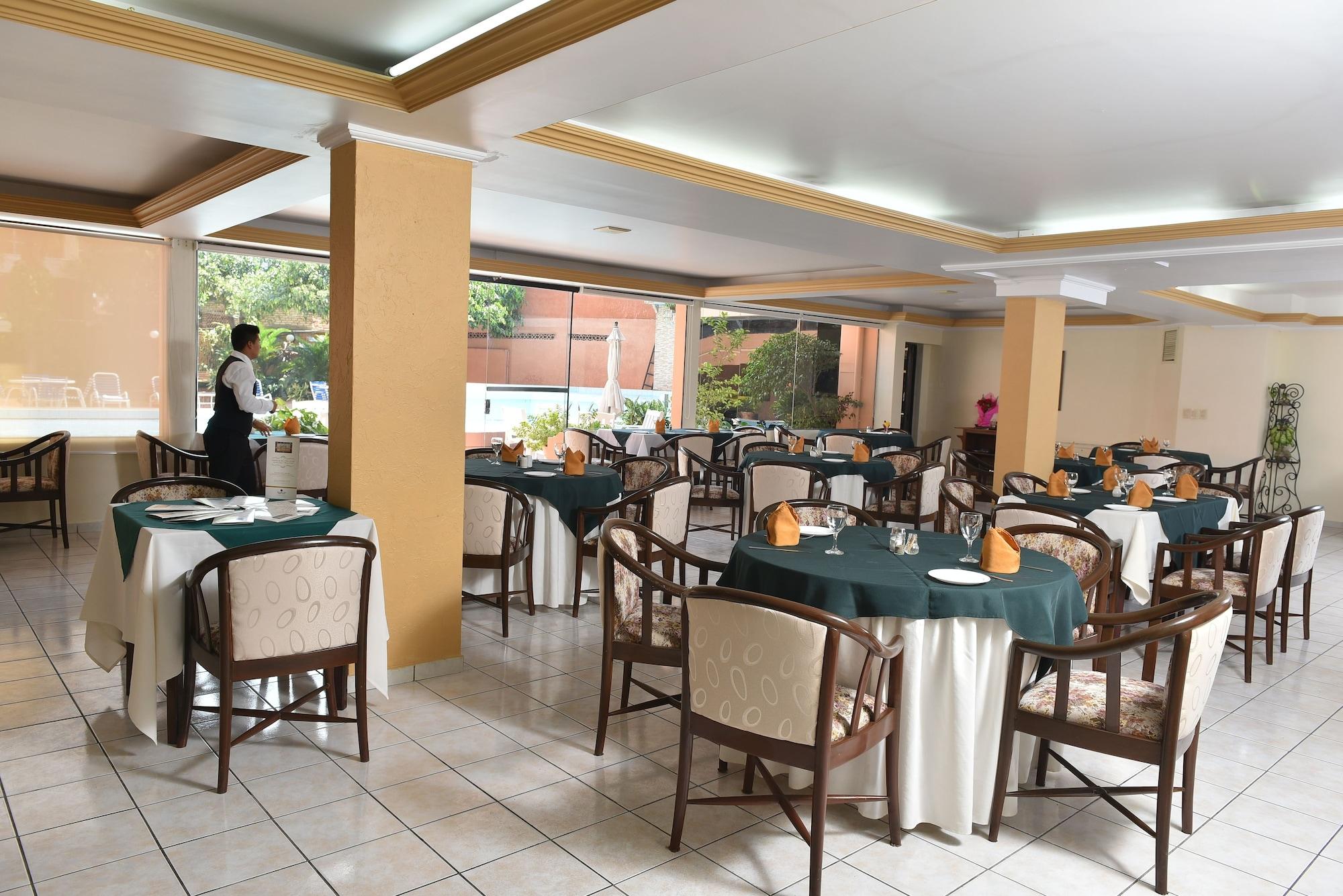 Restaurant House Inn Apart Hotel