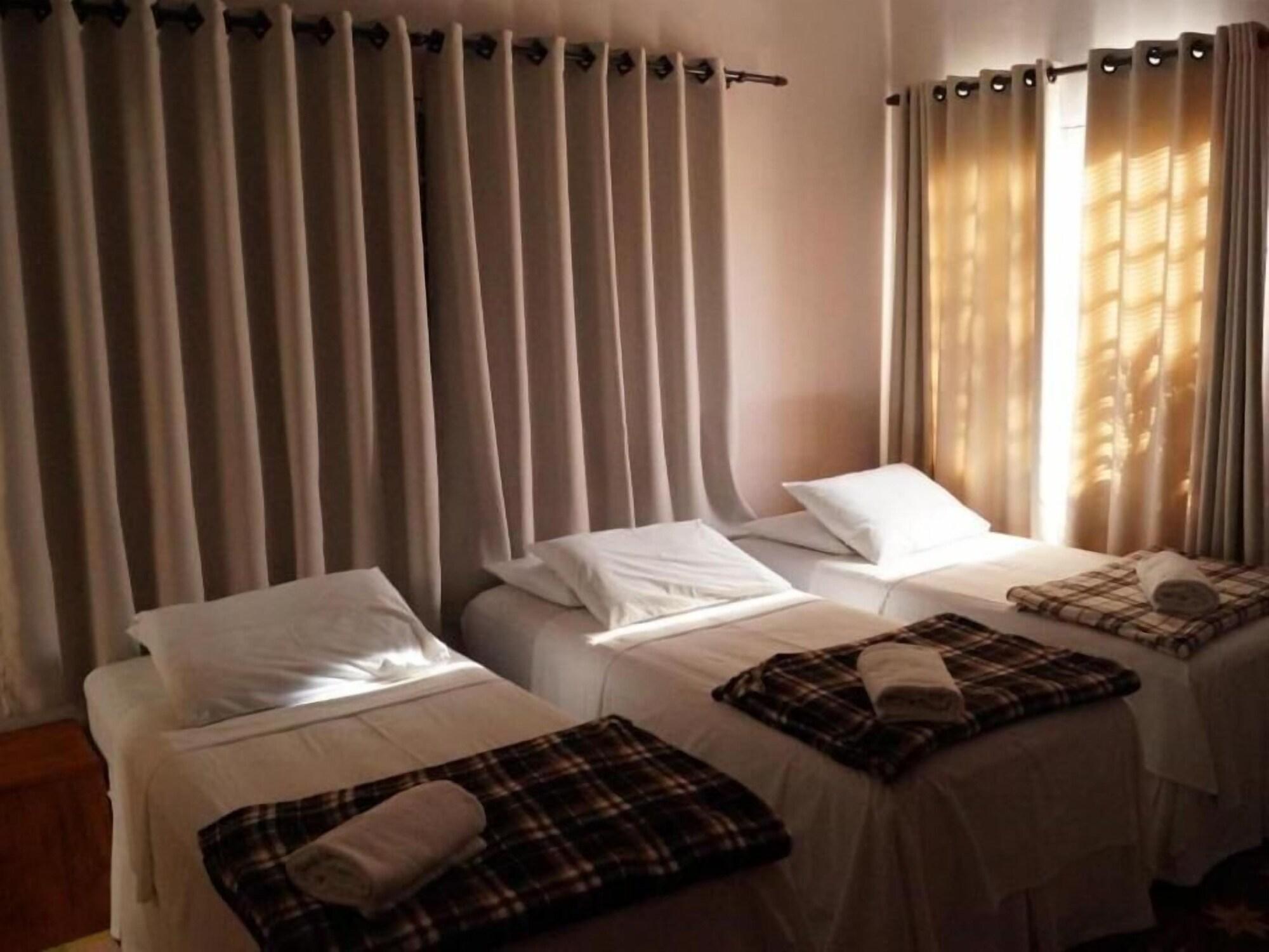 Quarto Ipê Rosa Hotel