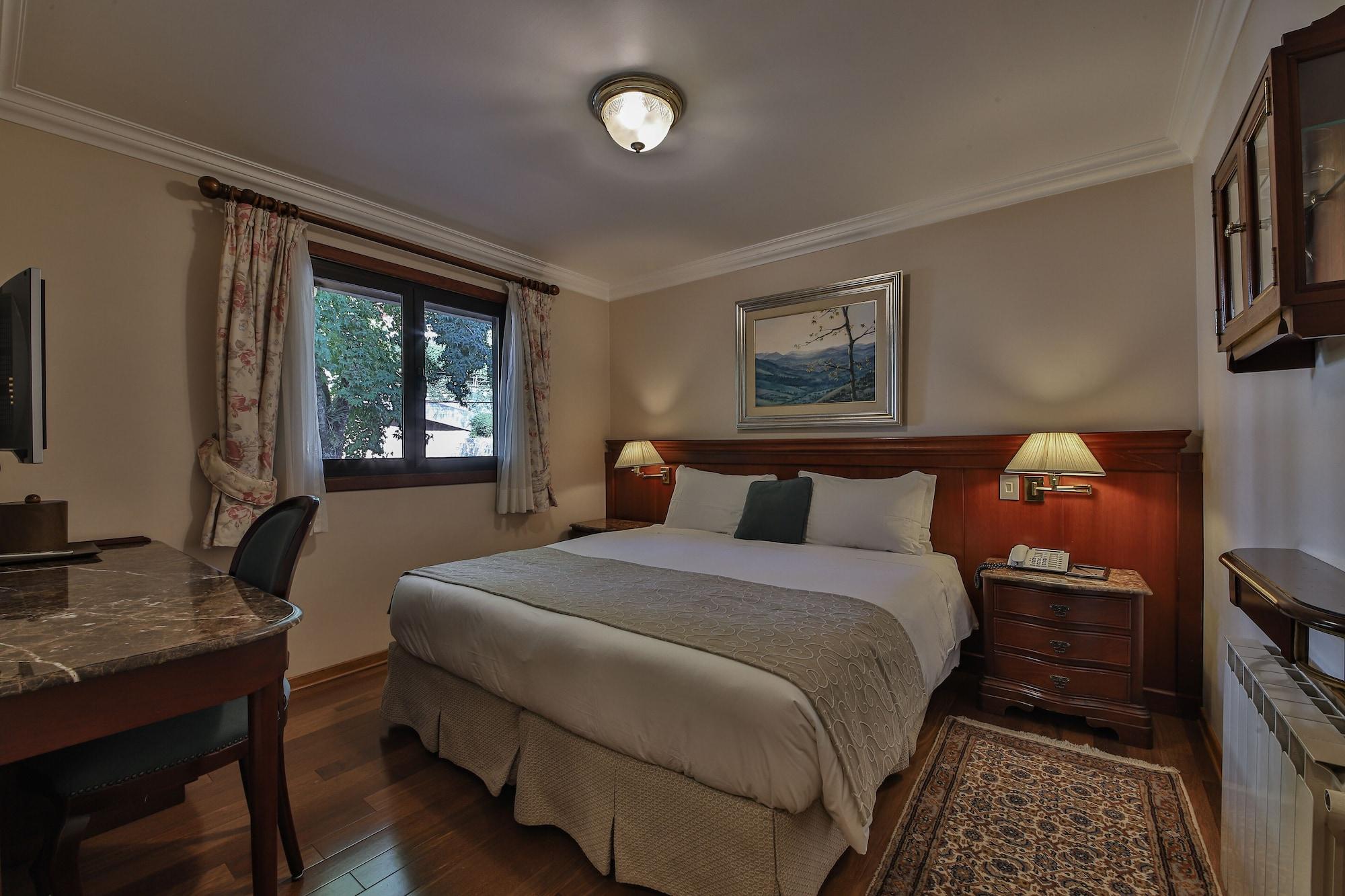 Habitación Le Suisse Elegance Hotel