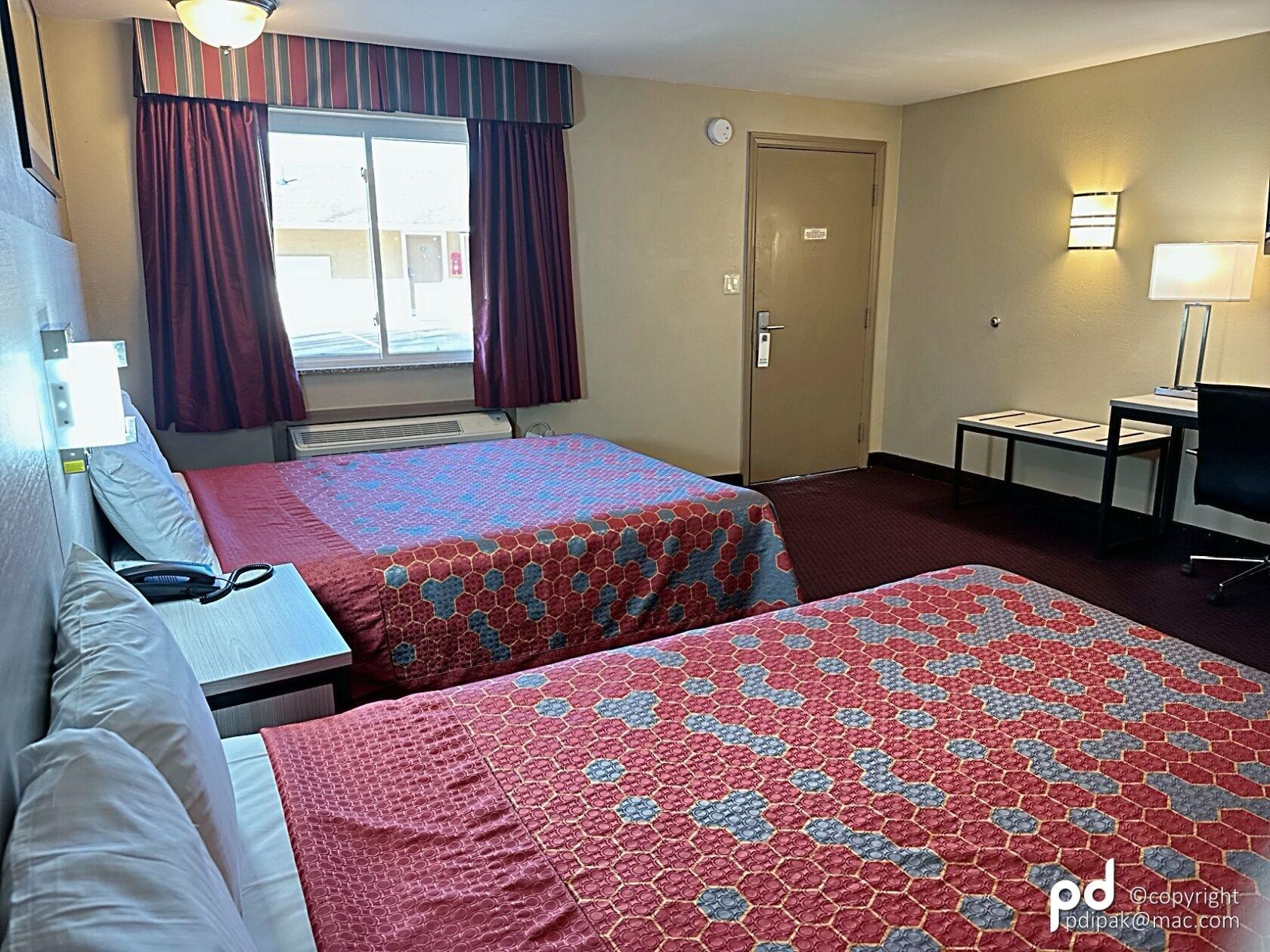 Habitación Travel Inn & Suites